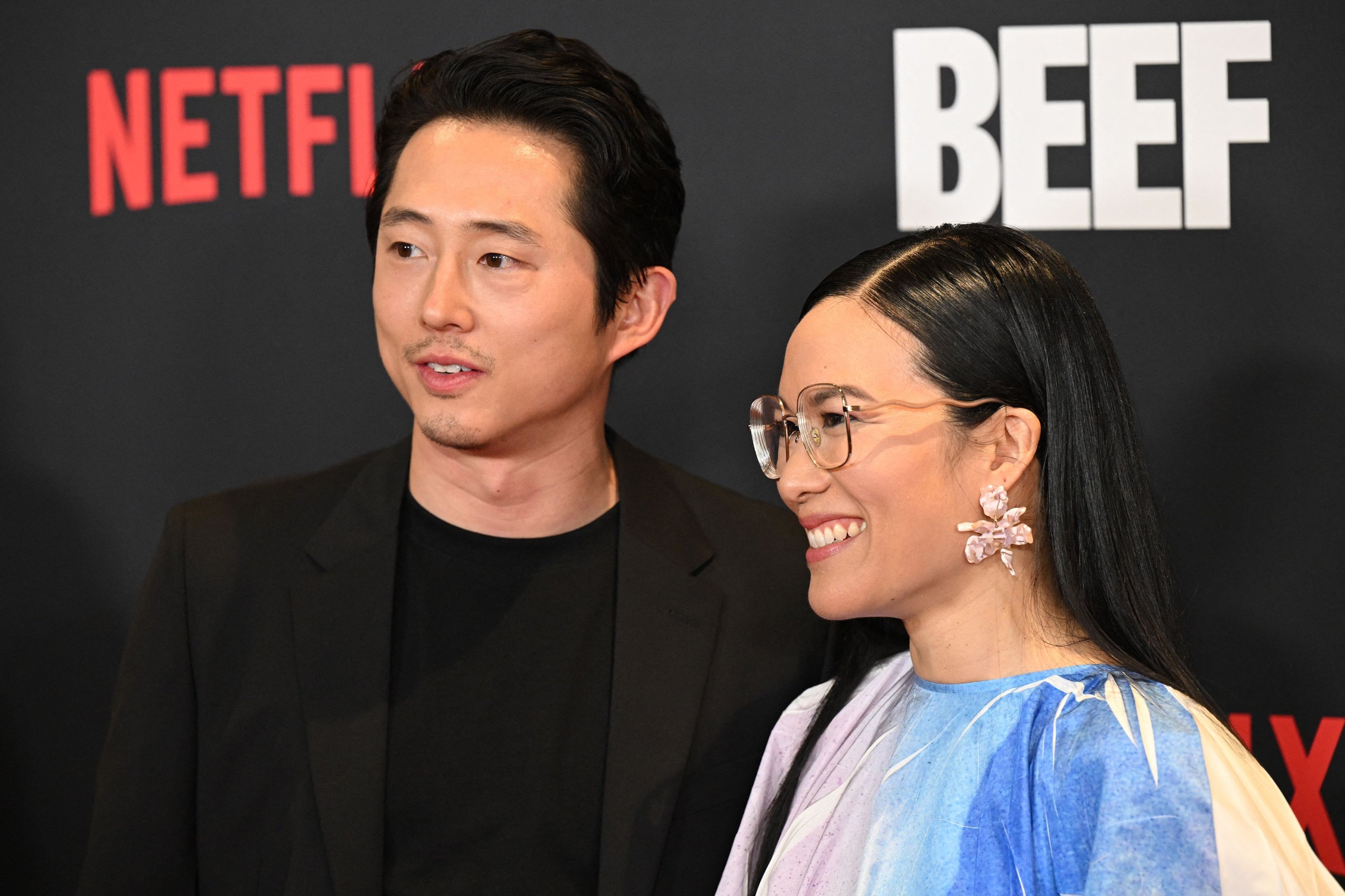 281913 Actors and executive producers Steven Yeun and Ali Wong arrive for the Los Angeles premiere of Netflix's
