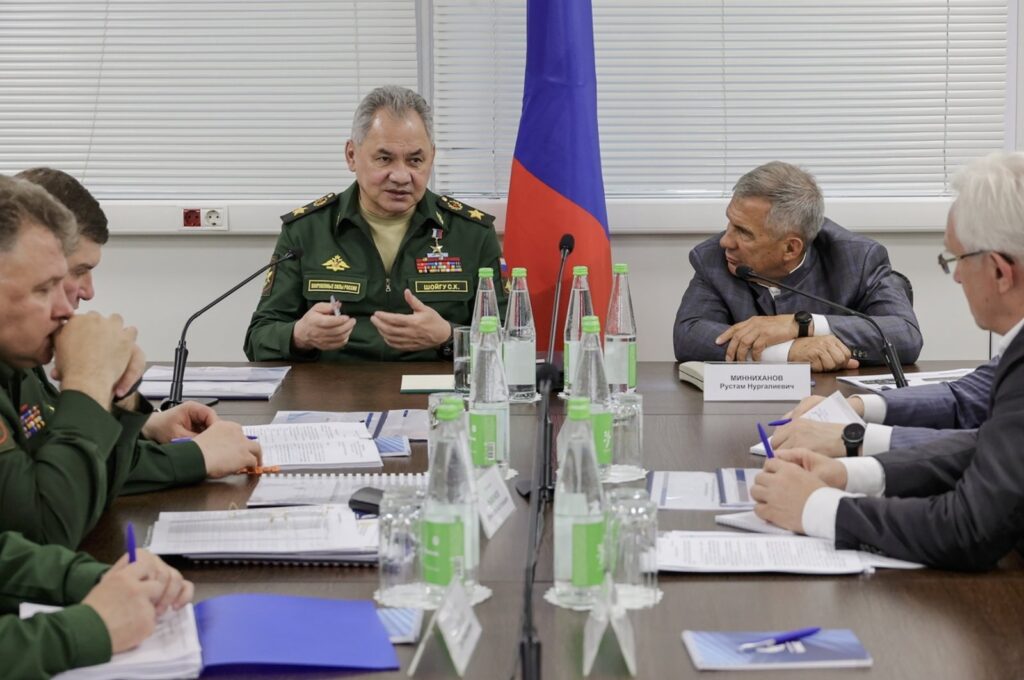 Russian Defense Minister General of the Army Sergei Shoigu (C-L) speaking during a meeting upon his visit to inspect the implementation of the state defense orders at enterprises in the Republic of Tatarstan, Russia, July 11, 2023. (Russian Defense Ministry press service handout via EPA)