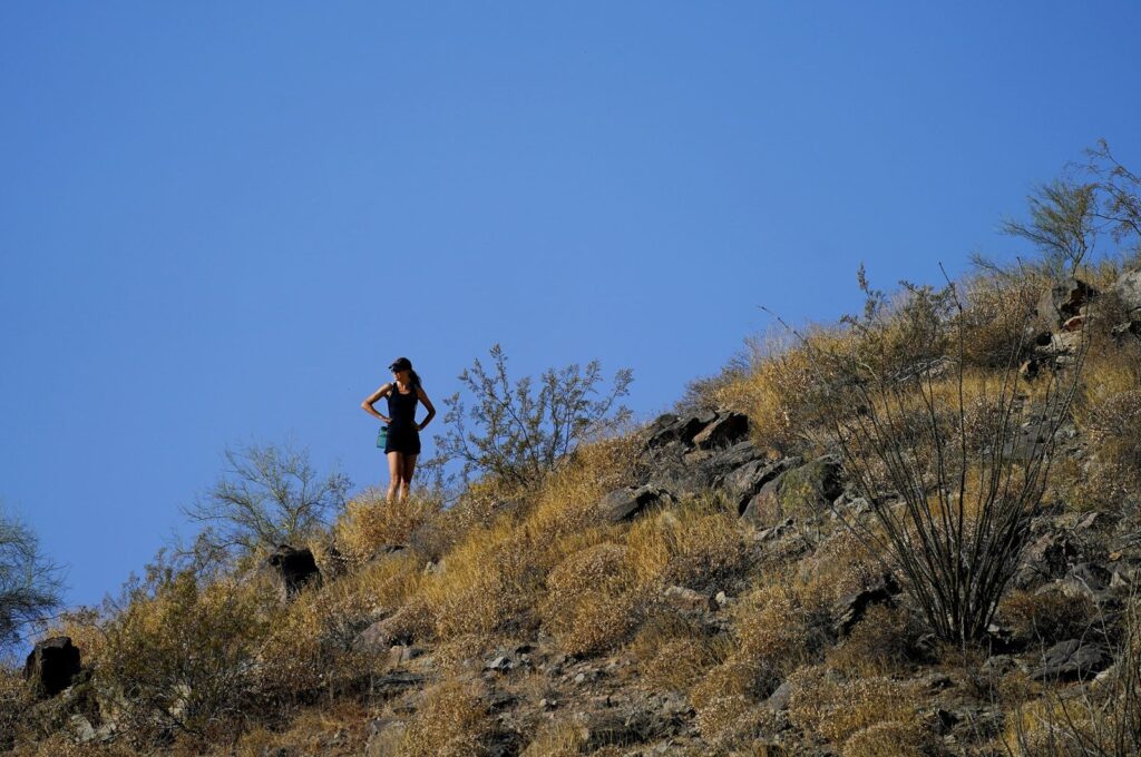 A hiker pauses during her hike, in Phoenix, U.S., July 10, 2023. (AP Photo)