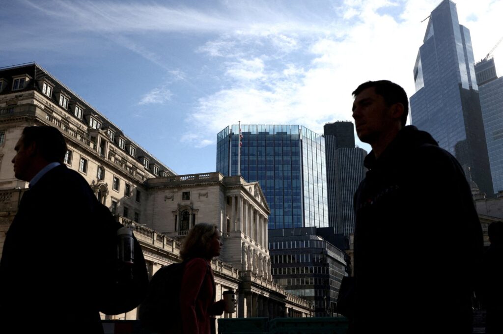 People walk outside the Bank of England in the City of London financial district in London, Britain, May 11, 2023. (Reuters Photo)