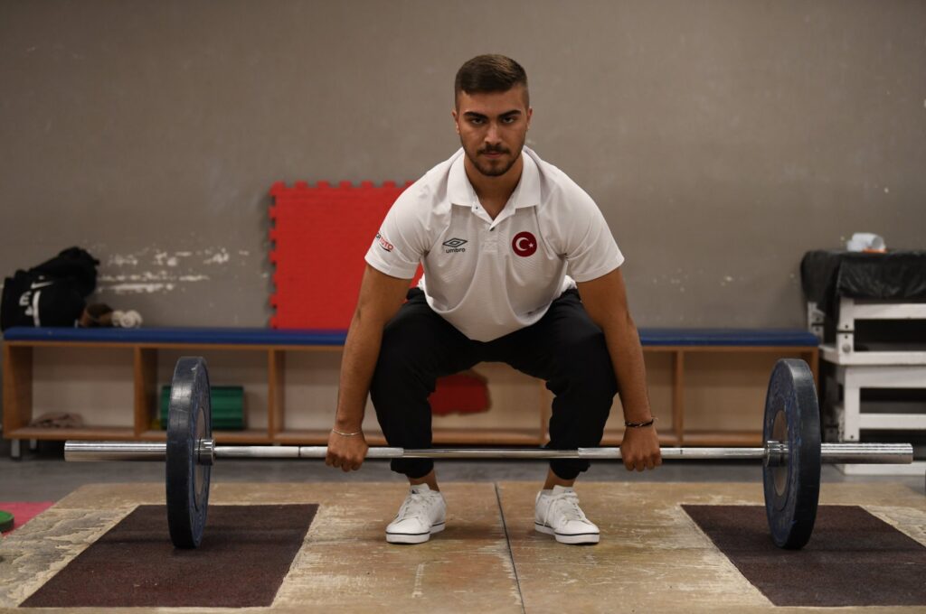 Young Turkish weightlifter Sami Baki Kıymet showcases his skills during training at the Seljuk Belediyespor Club, Konya, Türkiye, July 12, 2023. (AA Photo)