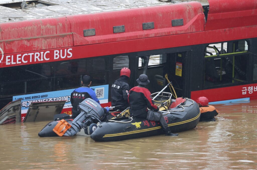Rescuers conduct a search operation at an underground tunnel in Cheongju, South Korea, July 16, 2023. (AP Photo)
