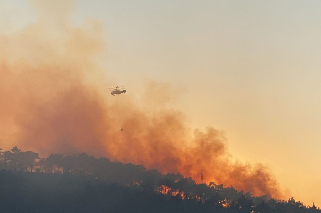 Helicopters extinguish a fire in Hatay's Belen district, Türkiye, July 16, 2023. (AA Photo)