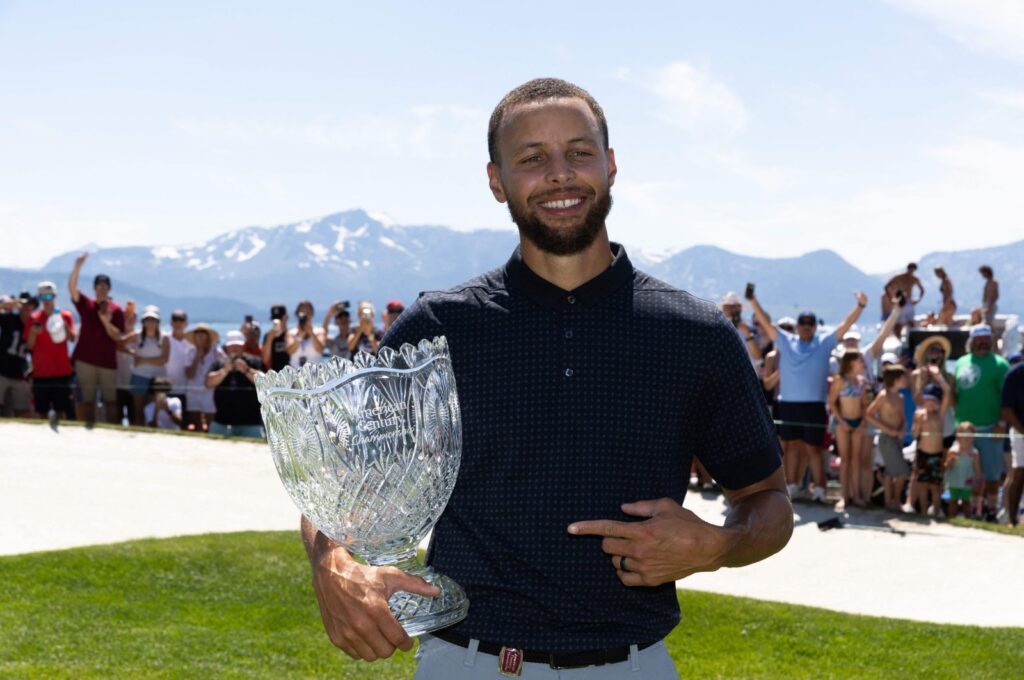 Stephen Curry of the NBA Golden State Warriors holds his trophy after winning the championship on Day Three of the 2023 American Century Championship at Edgewood Tahoe Golf Course, Stateline, Nevada, U.S., July 16, 2023. (AFP Photo)