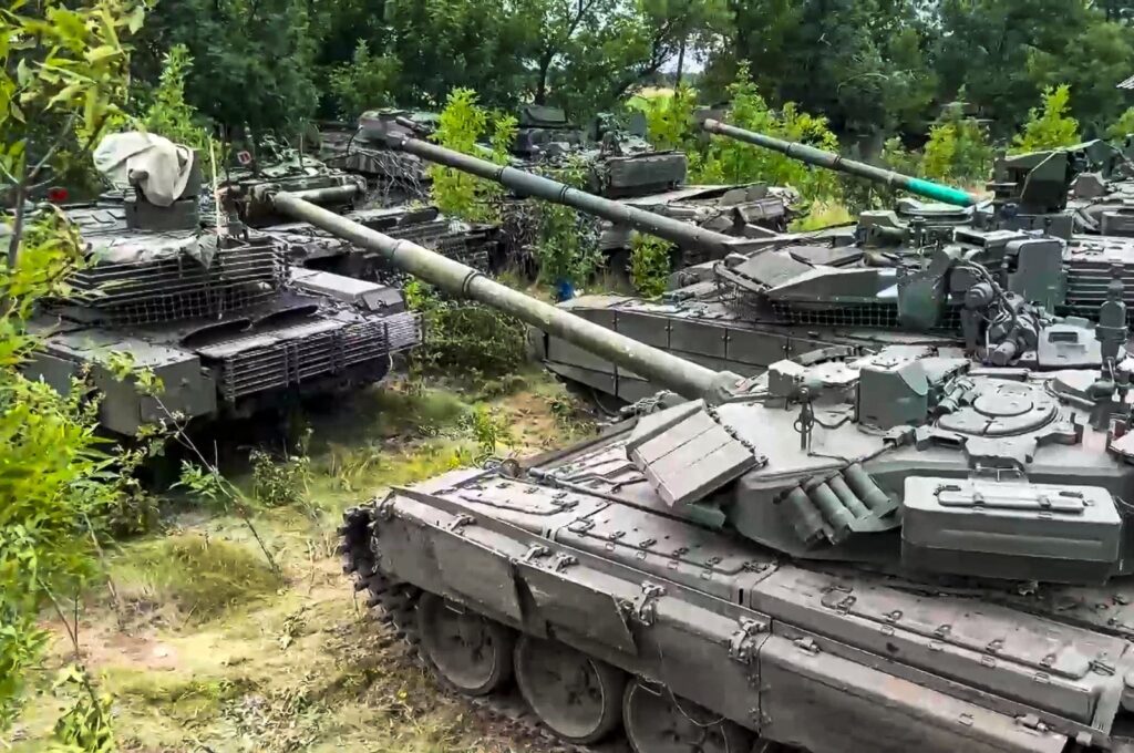 Tanks belonging to Russia's Wagner military contractor are parked ahead of their handover to the Russian military at an undisclosed location, July 12, 2023. (AP Photo)