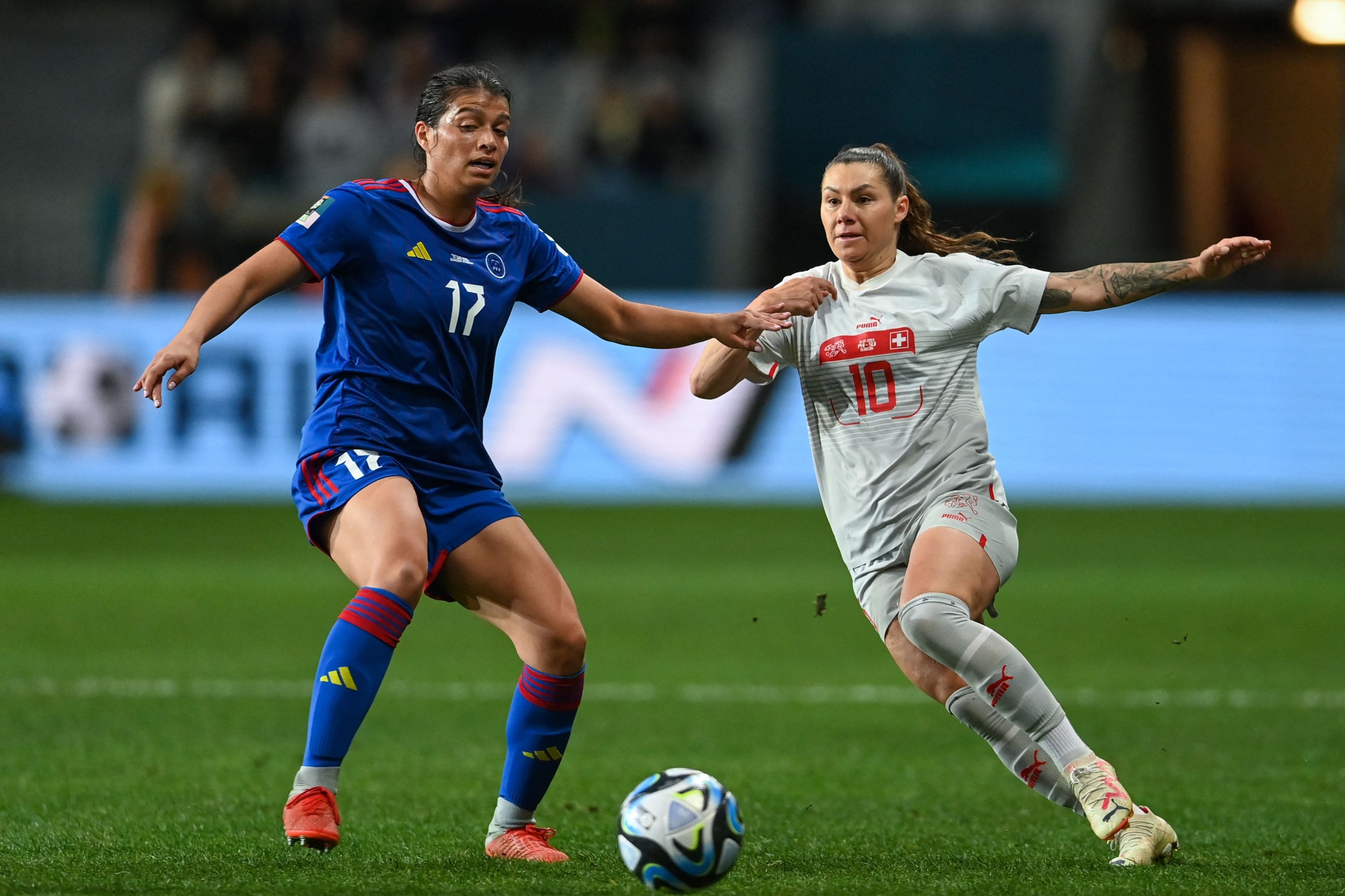 283605 Philippines' defender Alicia Barker (L) and Switzerland's forward Ramona Bachmann fight for the ball during the Australia and New Zealand 2023 Women's World Cup Group A football match between the Philippines and Switzerland at Dunedin Stadium, Dunedin, New Zealand, July 21, 2023. (AFP Photo)
