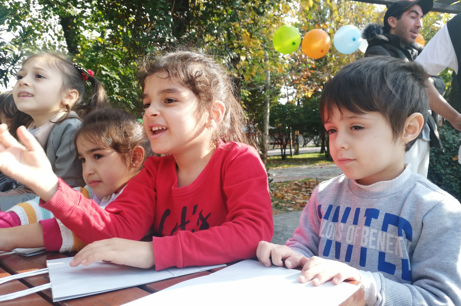 Syrian orphans participate in an activity at a local park in Istanbul, Türkiye, July 27, 2023. (Photo by Sisa Bodani)
