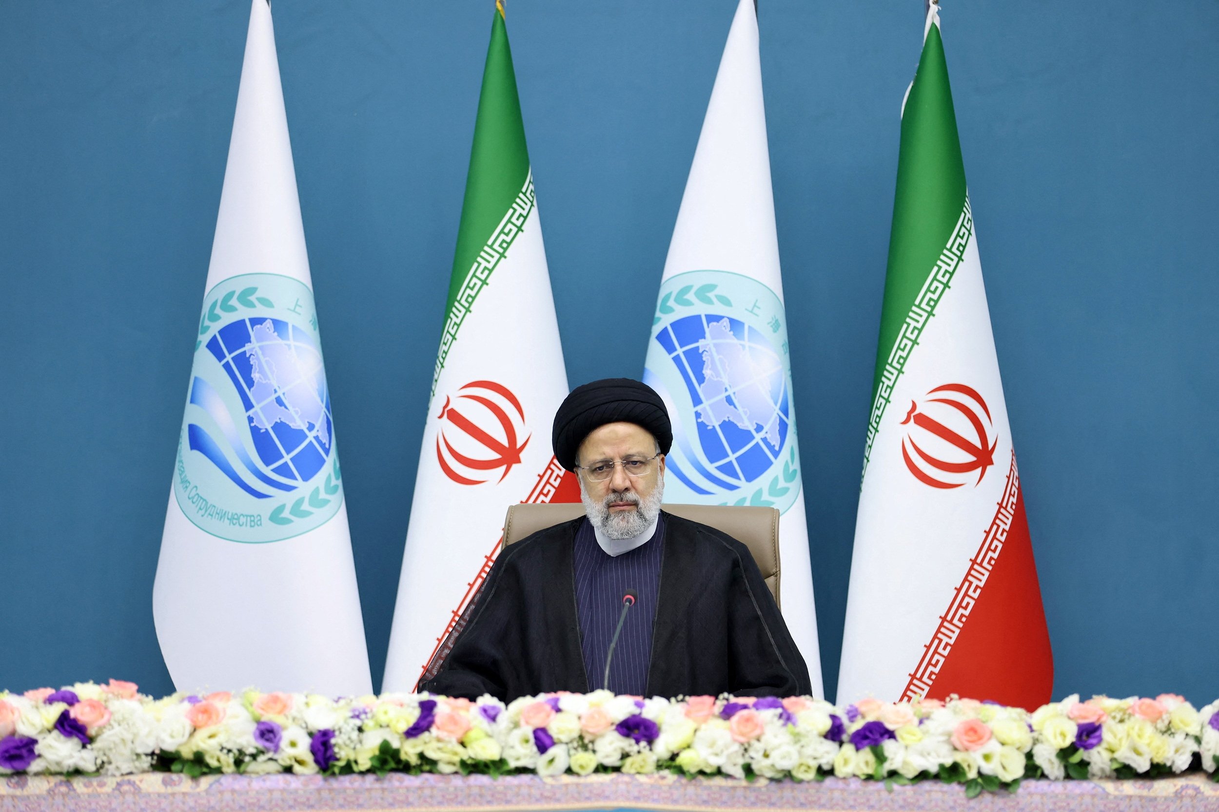 284560 Iranian President Ebrahim Raisi attends the 23rd Shanghai Cooperation Organisation Council of Heads of State (SCO) summit via video link from the Office of the President of Iran, Tehran, Iran, July 4, 2023. (Reuters Photo)