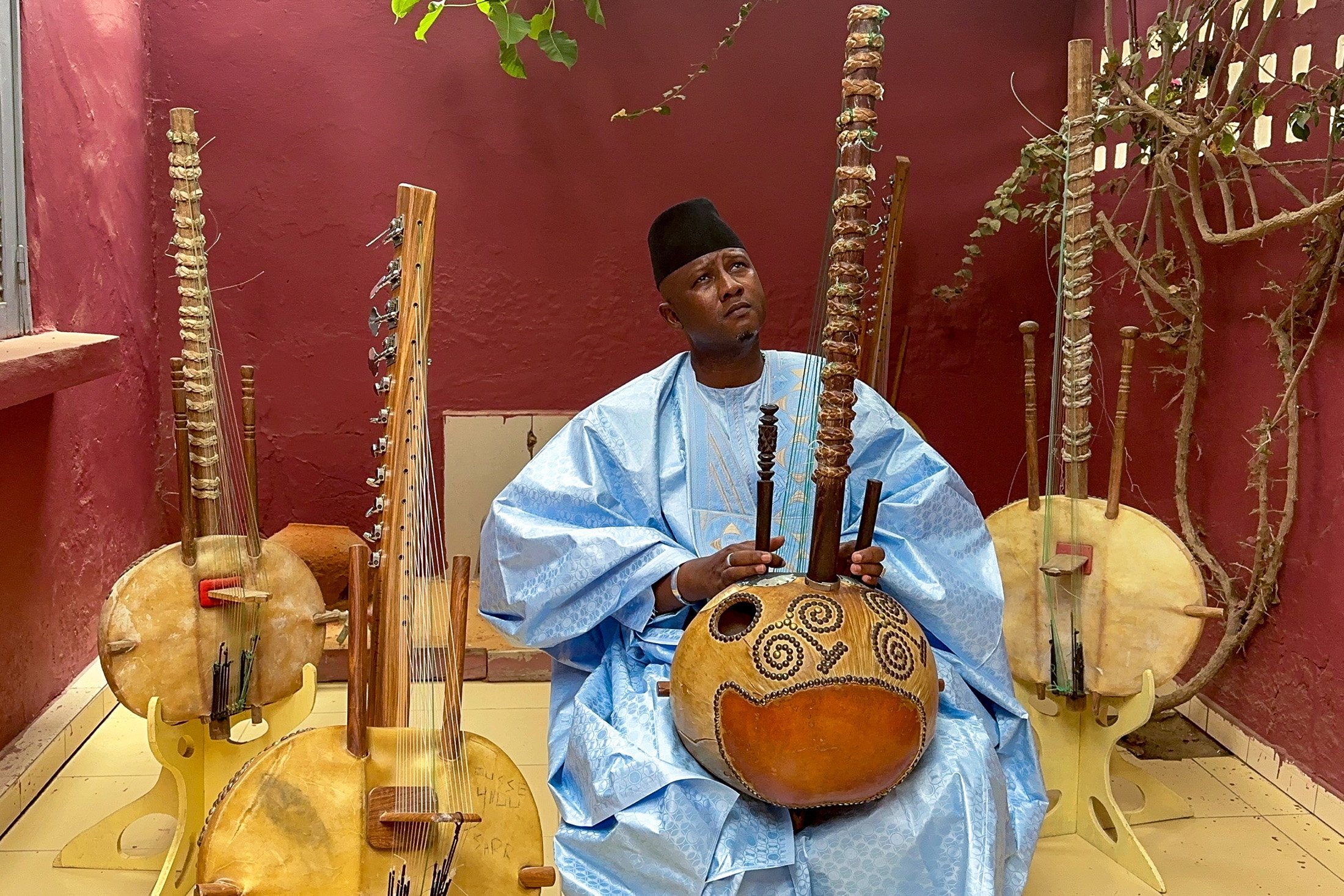284785 Famous Senegalese maestro Ablaye Cissoko plays the traditional kora instrument, in Saint-Louis, Senegal, July 27, 2023. (AA Photo)
