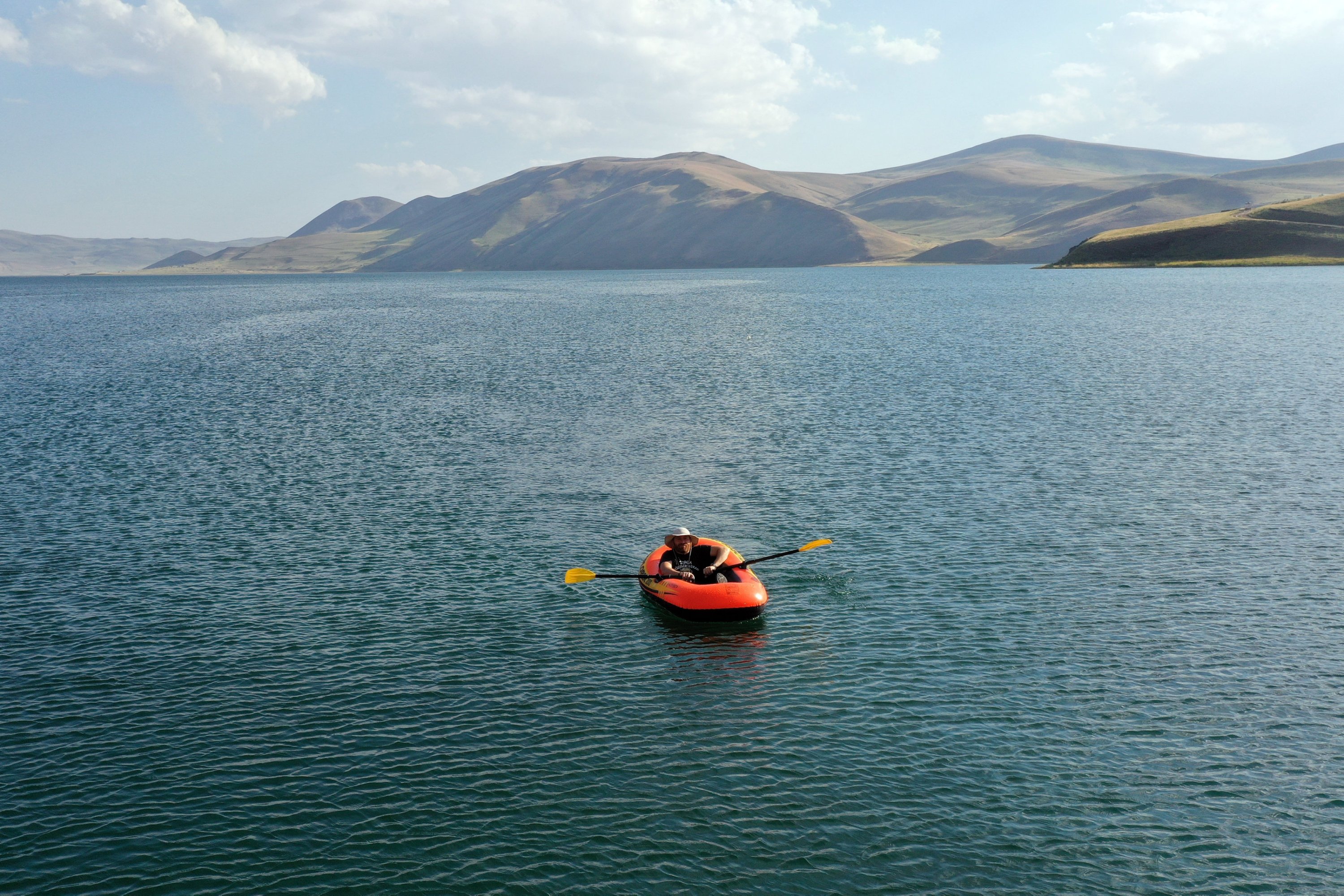 285742 A couple is photographed canoeing in scenic Balık Lake, Ağrı, eastern Türkiye, Aug. 3, 2023. (AA Photo)