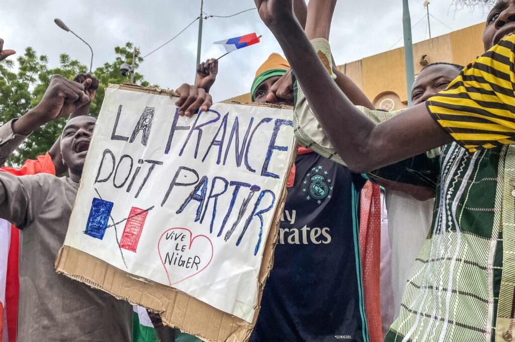 Protesters hold an anti-France placard during a demonstration in Niamey, Niger, Aug. 3, 2023. (AFP Photo)