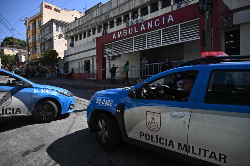 Police vehicles are seen outside a hospital treating people injured in anti-crime operations in Rio de Janeiro, Brazil, Aug. 2, 2023. (AFP Photo)