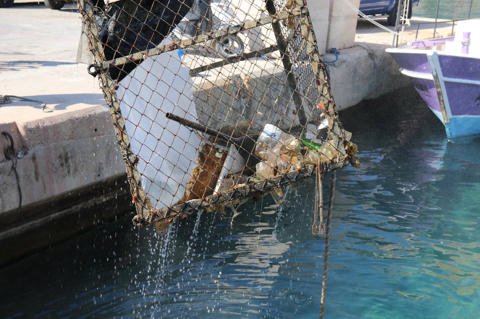 On of the waste cages within the scope of the underwater clearing campaign in Kaş, Antalya, southern Türkiye, Aug. 3, 2023. (AA Photo)