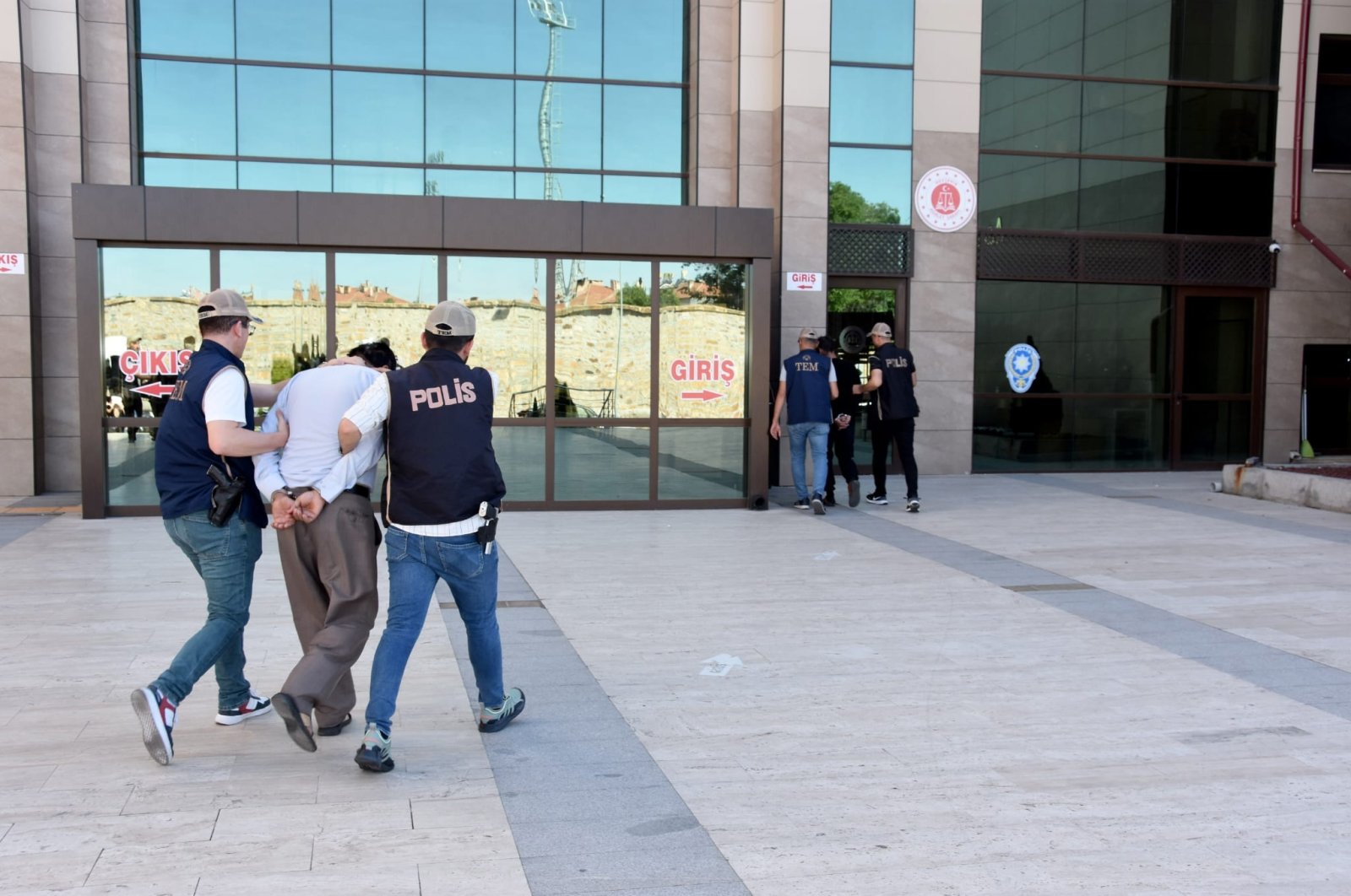 Police escort Daesh suspects captured in an operation, in Nevşehir, central Türkiye, July 15, 2023. (DHA Photo)
