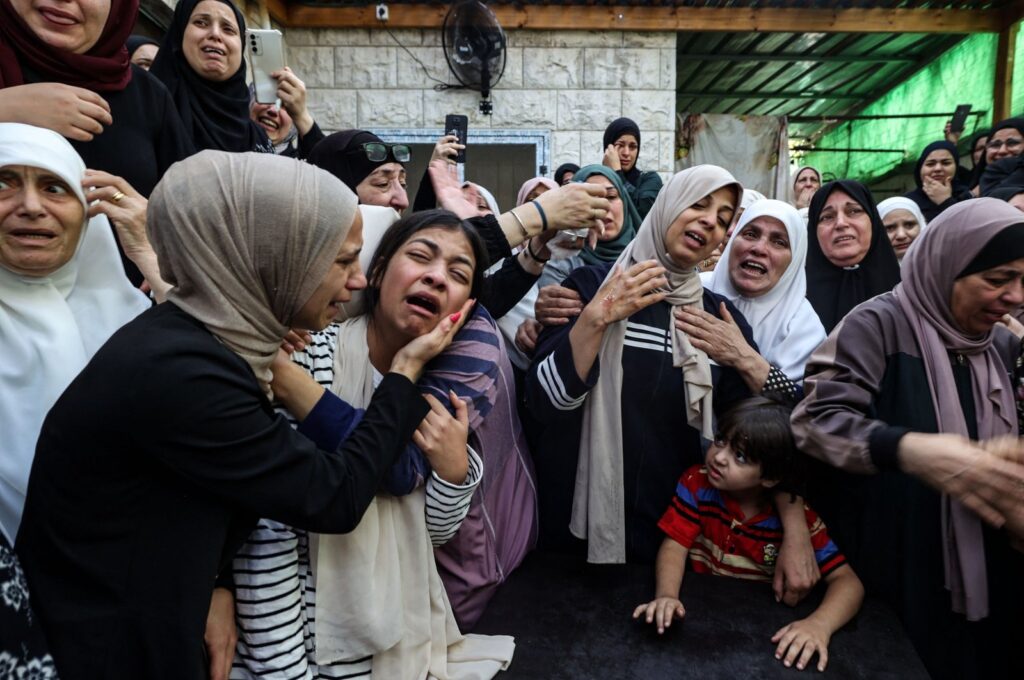 Mourners react during the funeral of Mahmoud Abu Saan in the occupied West Bank town of Tulkarm, Palestine, Aug. 4, 2023. (AFP Photo)