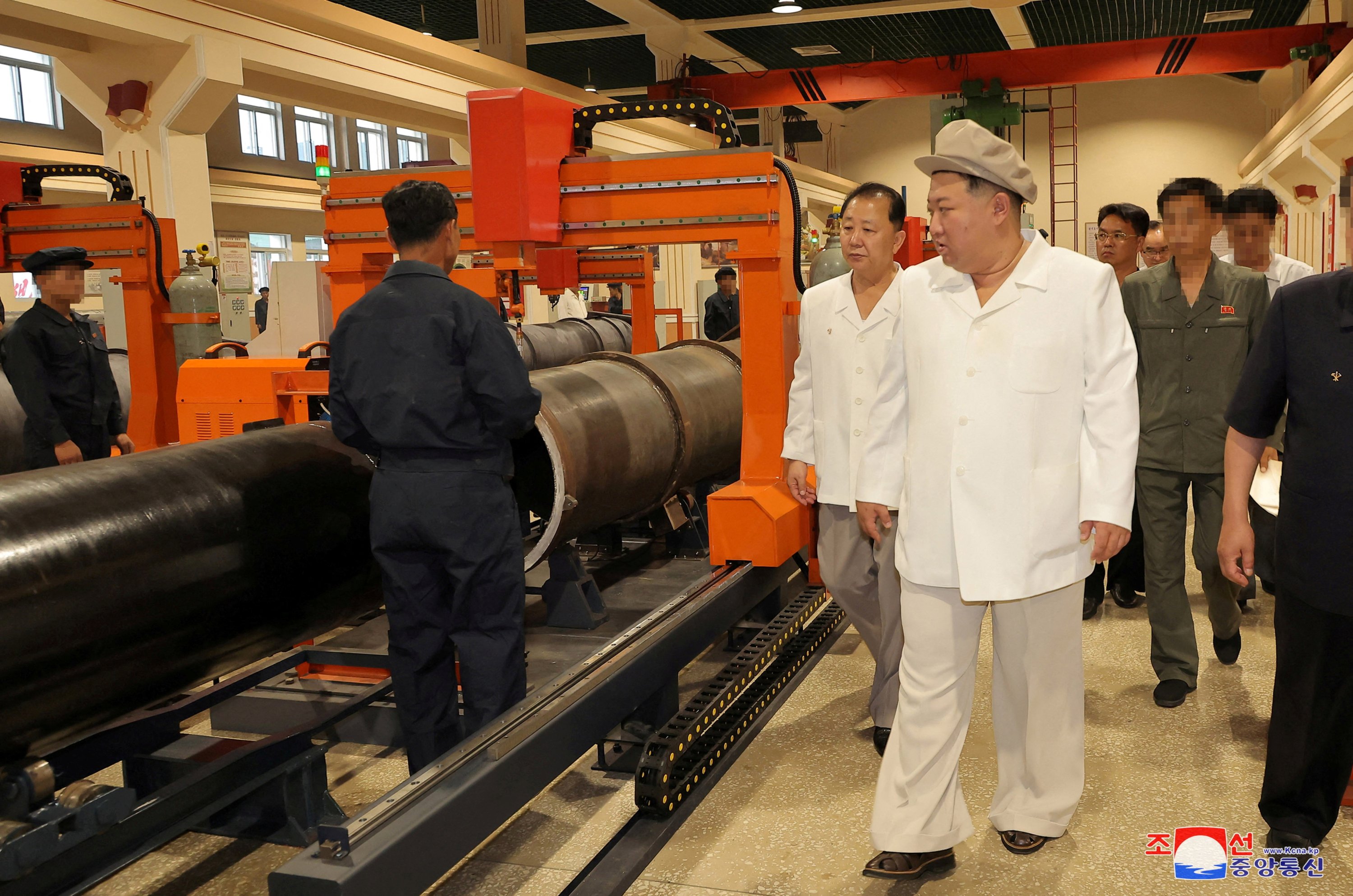 286157-1 North Korean leader Kim Jong Un gives field guidance at a major weapon factory at an undisclosed location, North Korea, Aug. 3, 2023. (Reuters Photo)