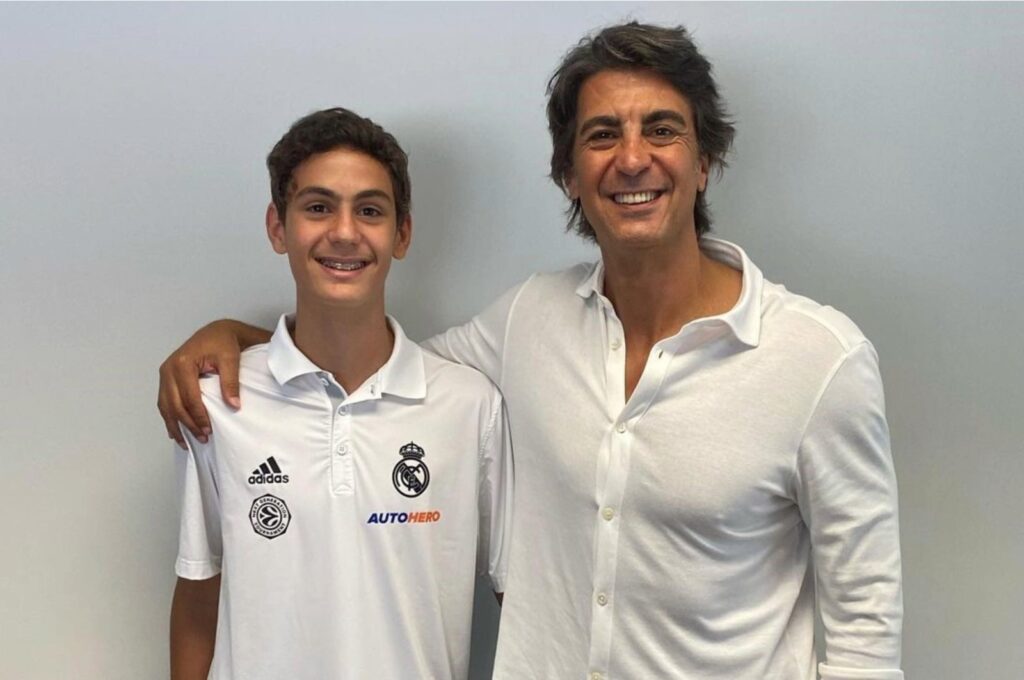 Former Turkish basketball star Ibrahim Kutluay (R) poses for a photo with his new Real Madrid star son Ömer Kutluay, Istanbul, Türkiye, Aug. 7, 2023. (IHA Photo)