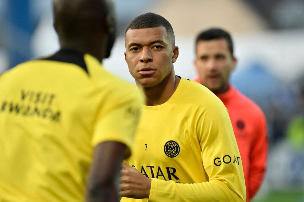 Paris Saint-Germain's French forward Kylian Mbappe looks on as he warms up before the French L1 football match between AJ Auxerre and PSG at Stade de l'Abbe-Deschamps, Auxerre, France, May 21, 2023. (AFP Photo)