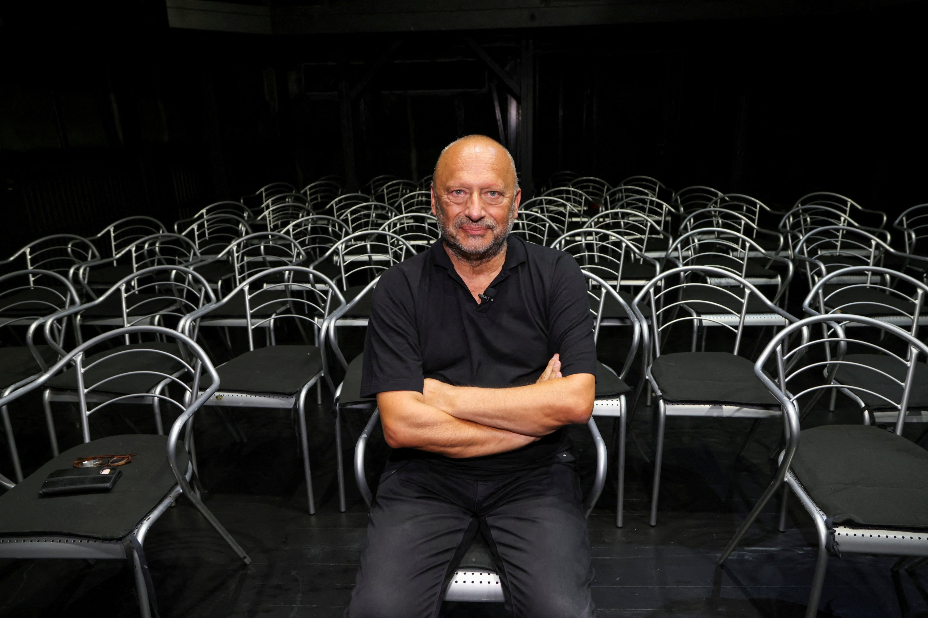 287123 Mirsad Purivatra, founder and director of the Sarajevo Film Festival, poses for a photo at the site where the first screening of films began during the Bosnian War, Sarajevo, Bosnia and Herzegovina, Aug. 11, 2023. (Reuters Photo)