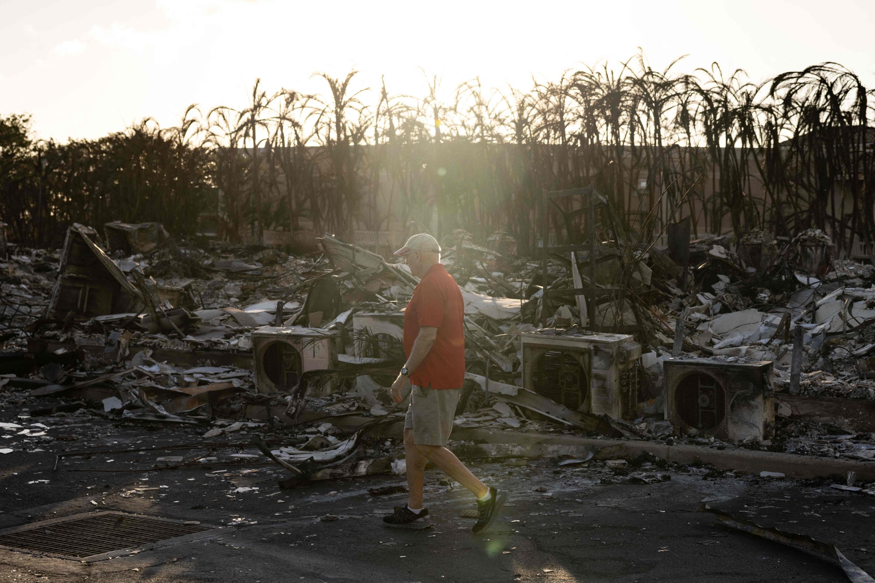 287182 A resident looks around a charred apartment complex in the aftermath of a wildfire in Lahaina, western Maui, Hawaii, U.S., Aug. 12, 2023. (AFP Photo)