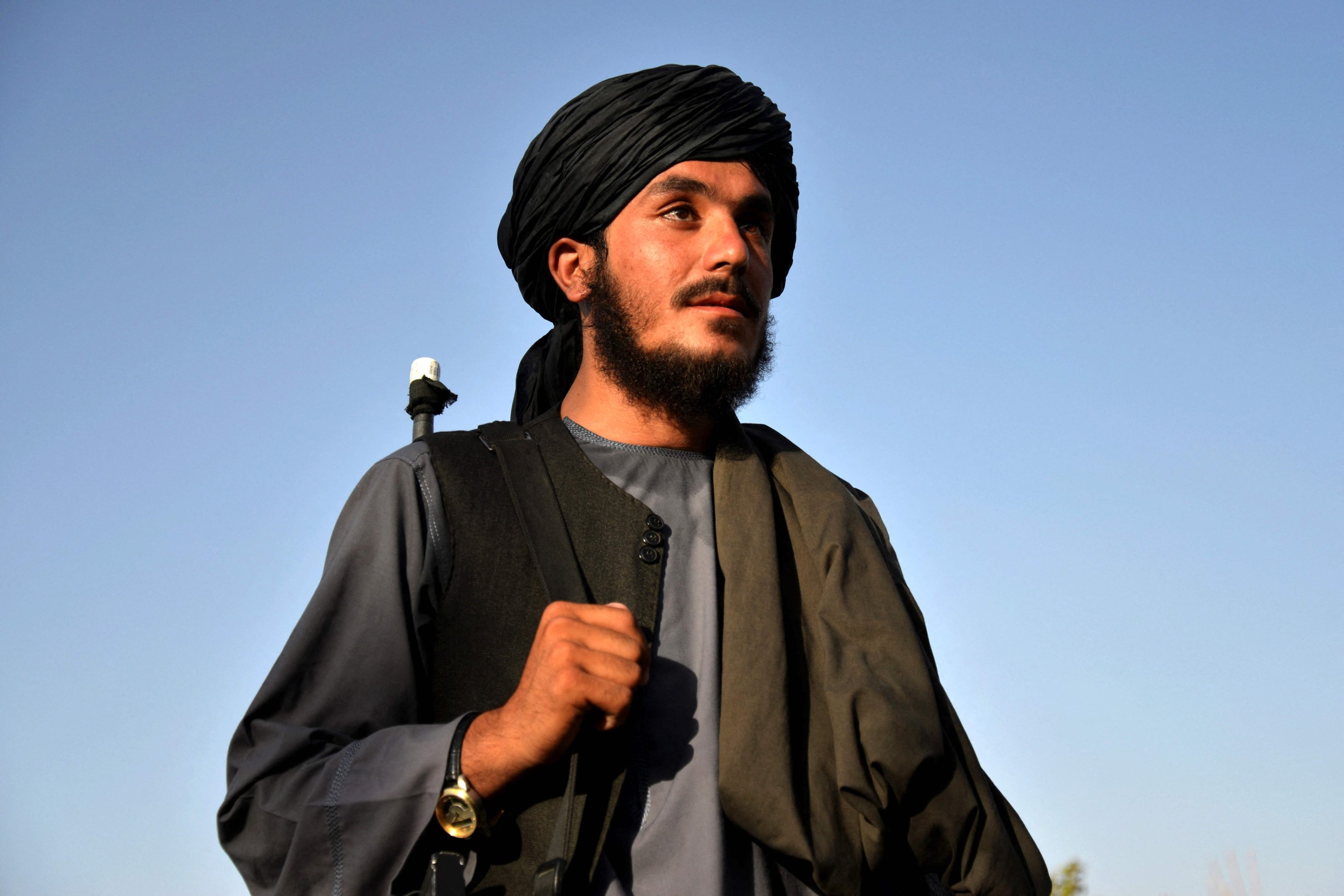 287389 Taliban security personnel Lal Muhammad stands guard at the police headquarters in Dand district of Kandahar province, Afghanistan, Aug. 1, 2023. (AFP Photo)