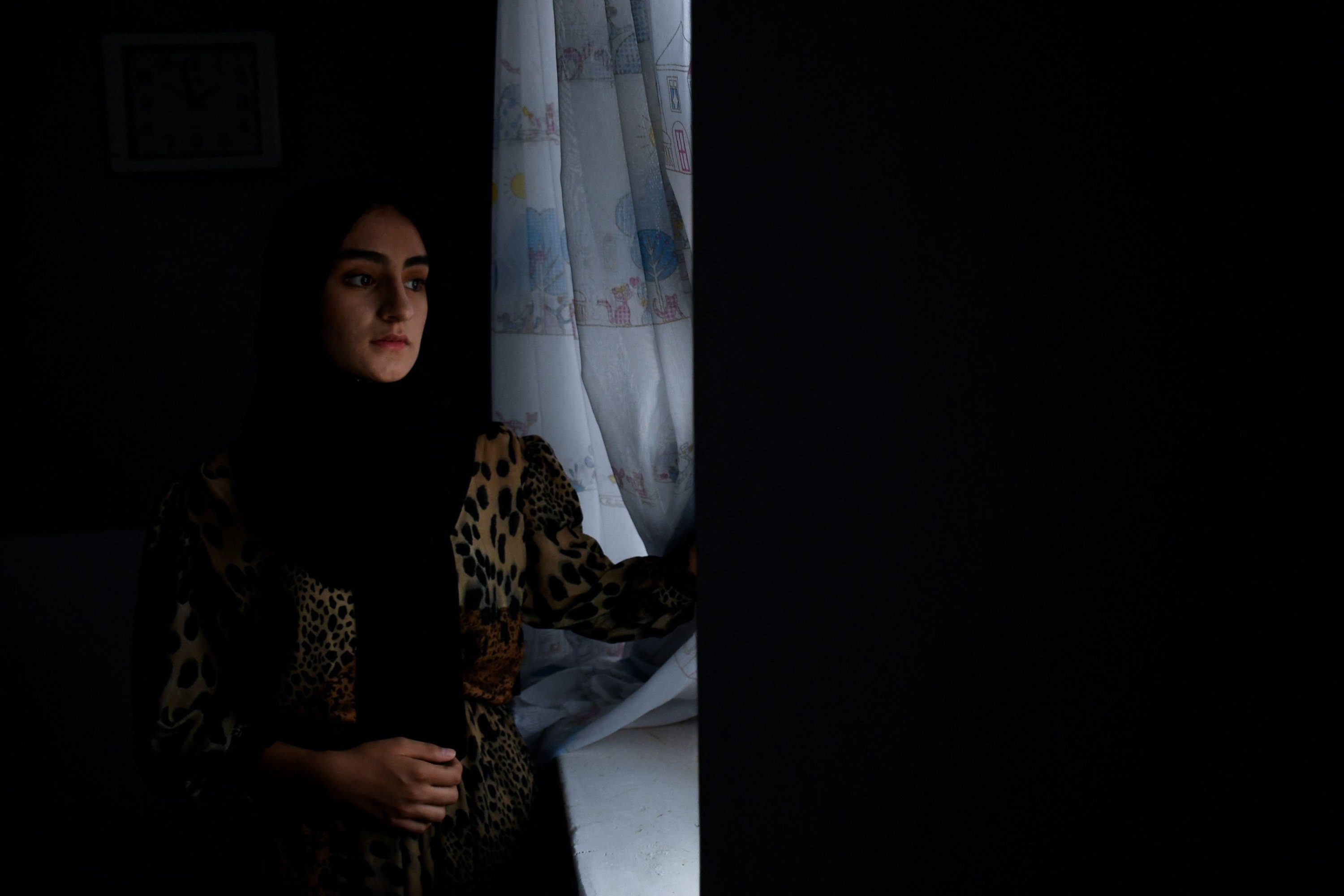 287390 Hamasah Bawar, a medical student poses for a photograph at her house in Mazar-i-Sharif, Afghanistan, Aug. 6, 2023. (AFP Photo)