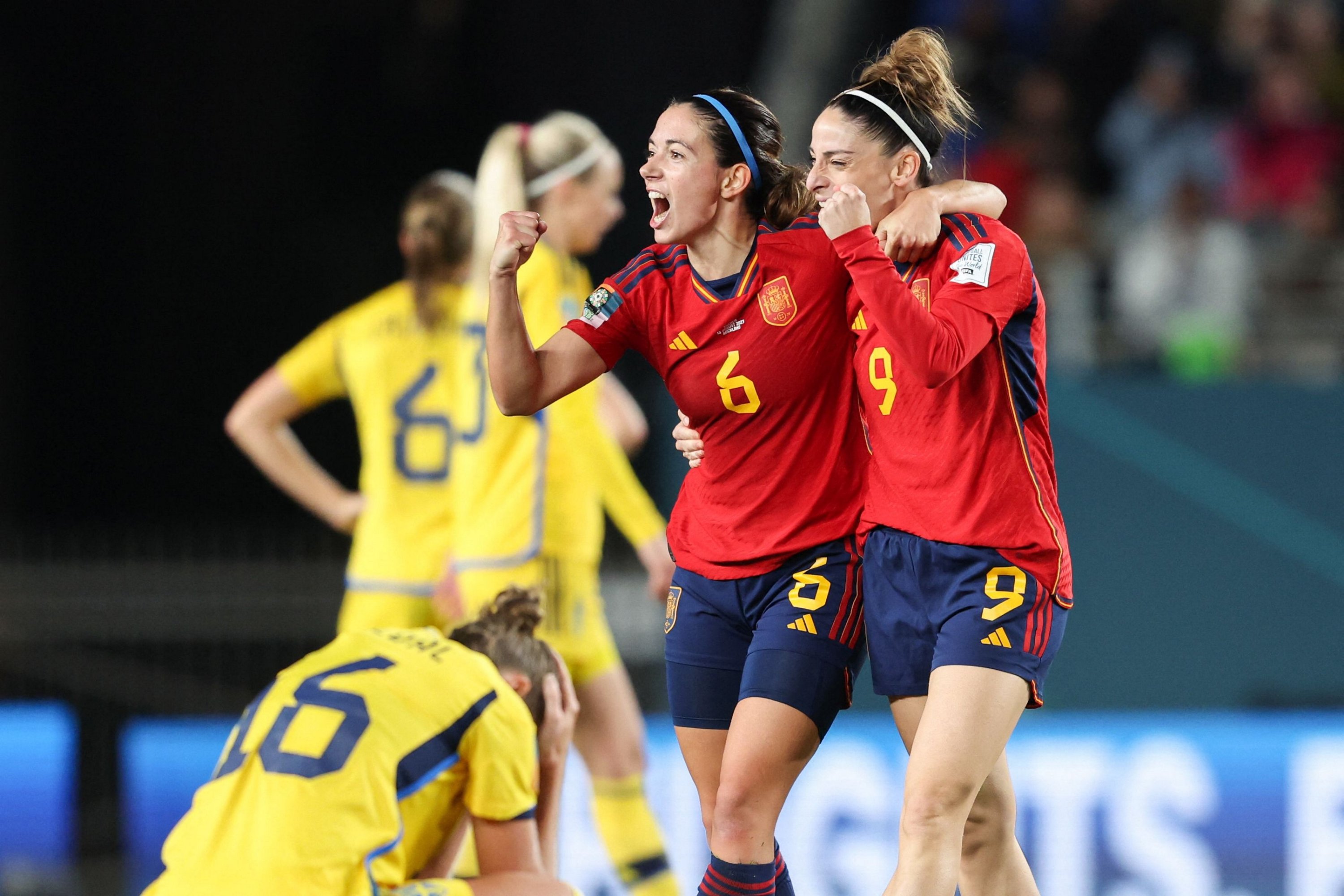 288011 Spain's forward Esther Gonzalez (R) and Aitana Bonmati celebrate their team's victory after the end of the Women's World Cup semifinal match against Sweden at Eden Park, Auckland, New Zealand, Aug. 15, 2023. (AFP Photo)