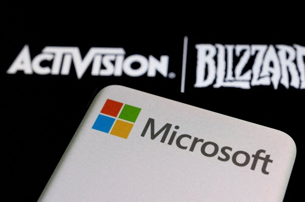 Microsoft logo on a smartphone placed on displayed Activision Blizzard logo in this illustration photo, Jan. 18, 2022. (Reuters Photo)