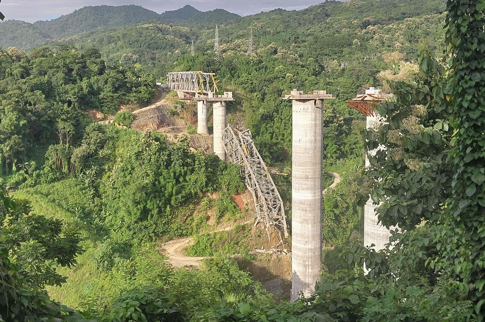 The site of an under-construction railway bridge that collapsed in Sairang, northeastern India, Aug. 23, 2023. (AFP Photo)