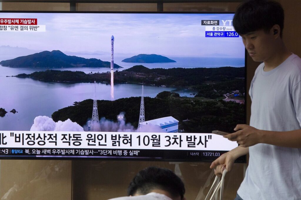 People watch a TV report on North Korea's botched space rocket launch at Seoul Station in Seoul, South Korea, Aug. 24, 2023. (EPA Photo)