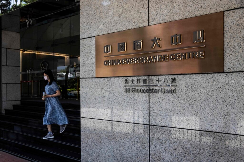A woman leaves the China Evergrande Centre in Hong Kong, China, July 28, 2022. (AFP Photo)