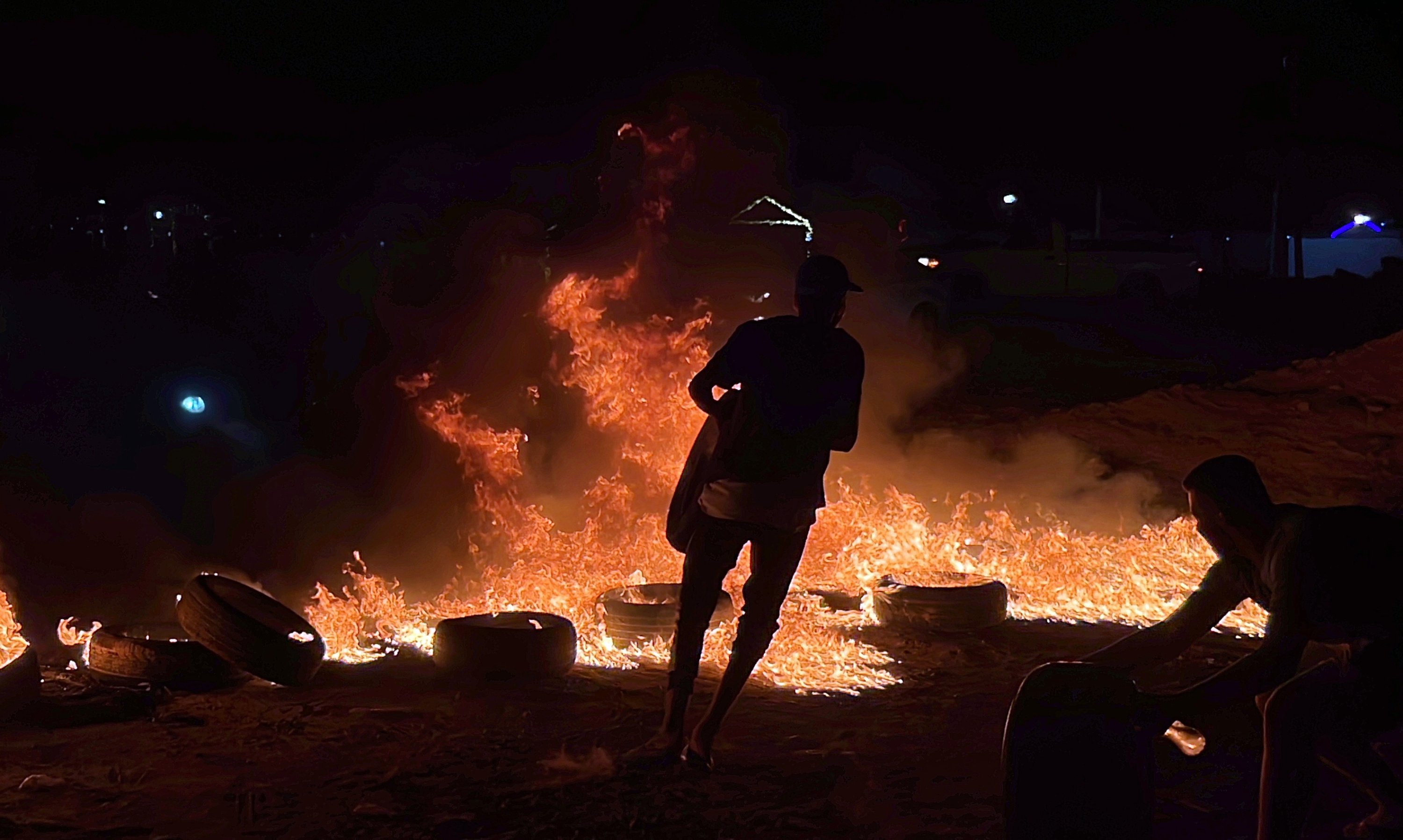 289374 Libyan demonstrators burn tires to protest against the meeting of foreign ministers of Libya and Israel, Tripoli, Libya, Aug. 28, 2023. (EPA Photo)