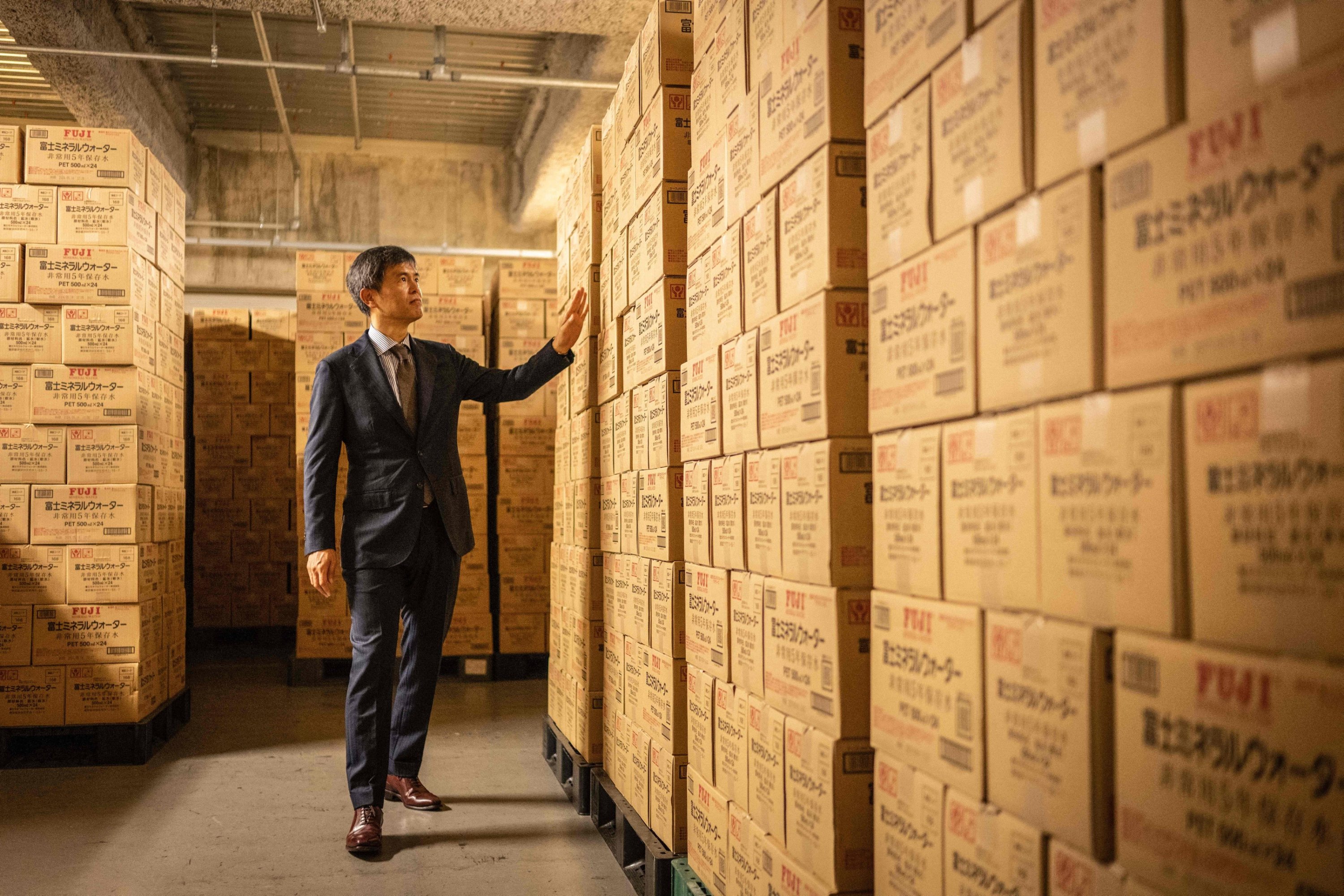 289706 Takashi Hosoda, head of disaster management at Mori Building, inspects the emergency supply warehouse of Roppongi Hills Mori Tower in Tokyo, Japan, June 12, 2023. (AFP Photo)