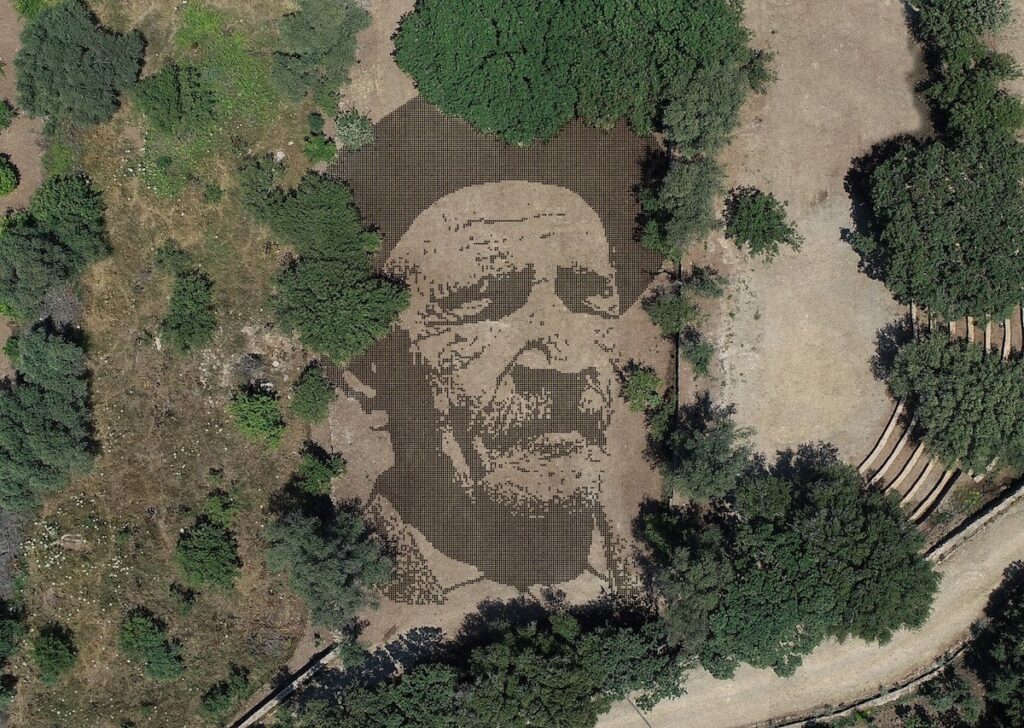 The portrait of Turkish folk poet Aşık Veysel is made of 25,000 handfuls of earth, Bodrum, Muğla, Türkiye, Sept. 3, 2023. (Photo courtesy of Gümüşlük Sia Familia)