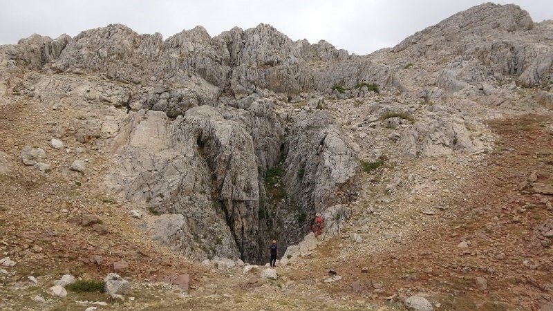 The entrance of Morca Cave at an altitude of 2,100 meters in the Anamur district of Mersin, Türkiye, Sept. 06, 2023. (IHA Photo)