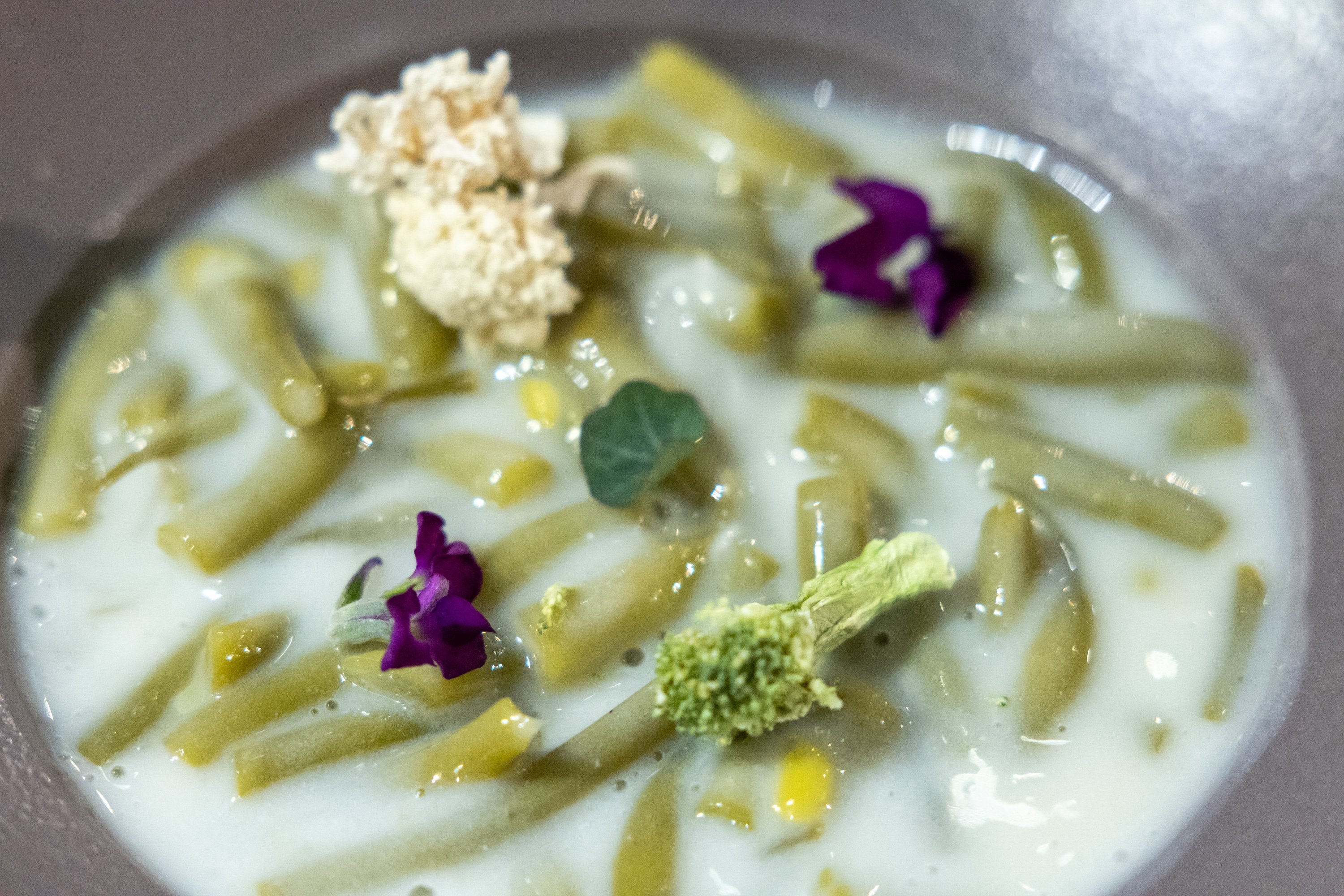 291065 The hors d'oeuvre cold fresh yellow bean stew with elderflower syrup, Istanbul, Türkiye, Sept. 6, 2023. (Photo by Emre Topdemir)