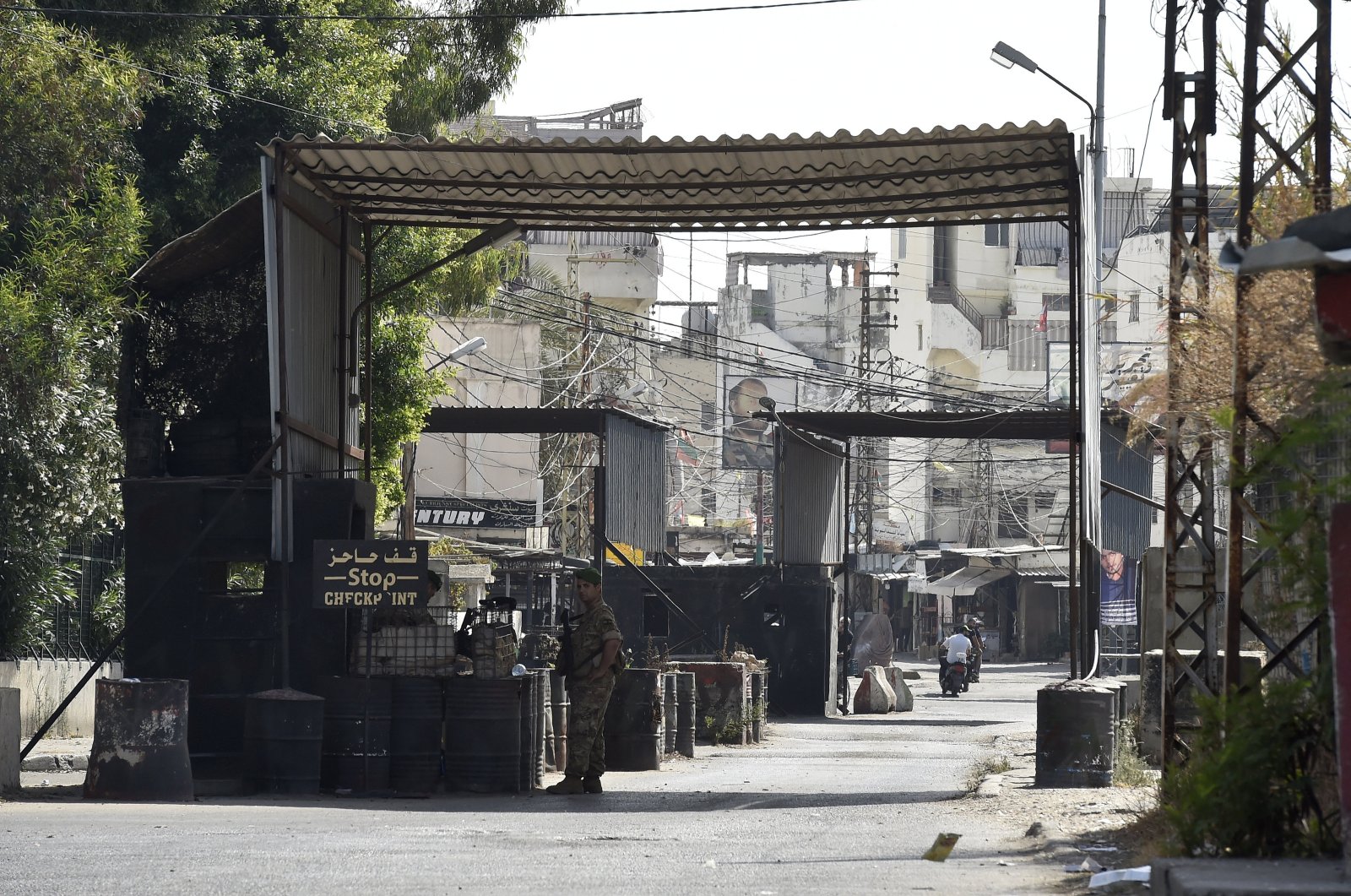 Lebanese army soldiers stand guard at the entrance of Ain el-Hilweh Palestinian refugee camp after clashes between supporters of the Fatah movement and rival groups erupted, in Sidon, Lebanon, Sept. 8, 2023. (EPA Photo)
