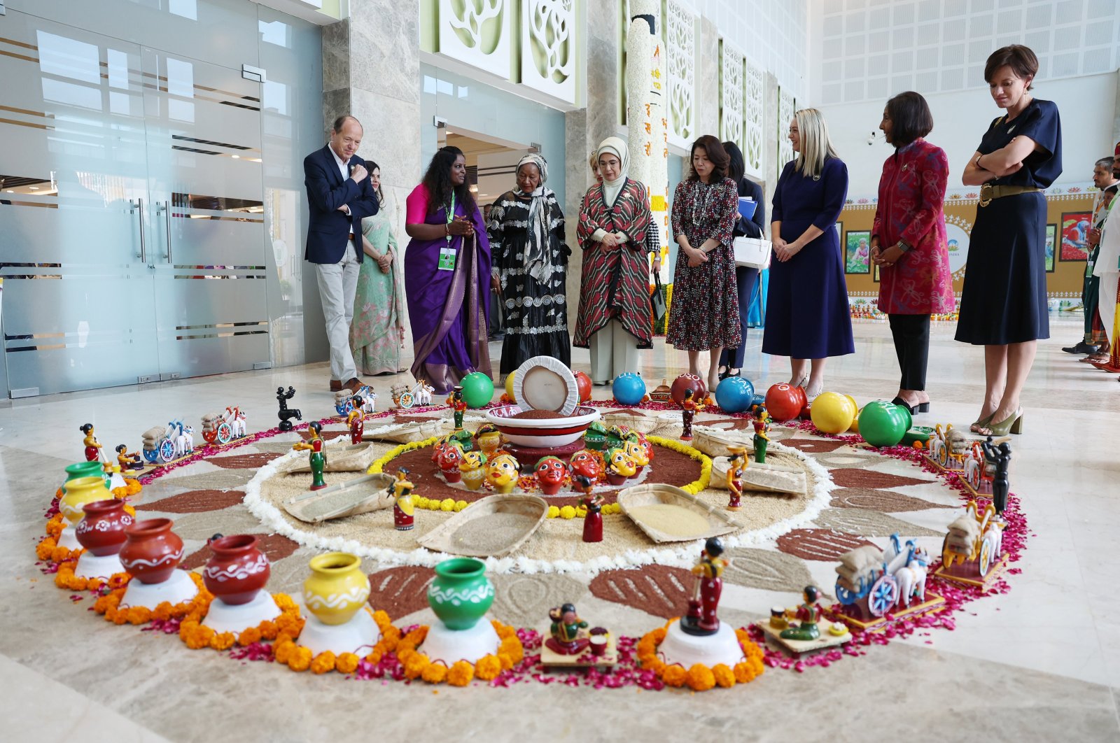 First lady Emine Erdoğan and the wives of other world leaders visit the Nanaji Deshmukh Plant Phenomics Center in New Delhi, India, Sept. 9, 2023. (AA Photo)