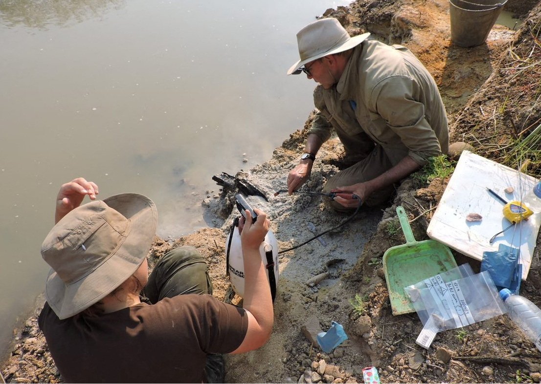 293187 Researchers uncover wooden artifacts on the banks of the Kalambo River in Zambia, near where the oldest-known use of wood in construction was found, in this handout image taken in July 2019. (Reuters Photo)