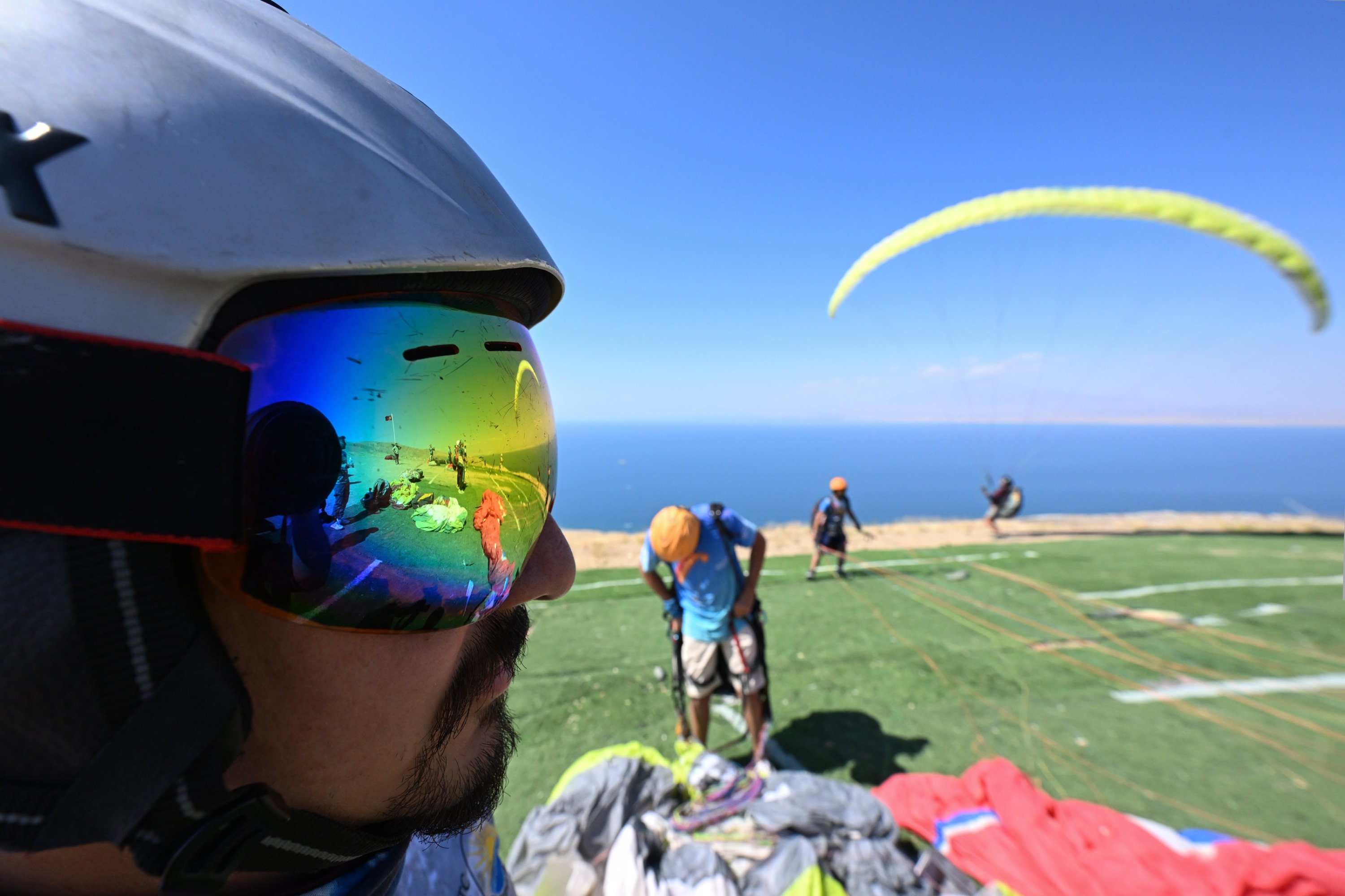 293511 Paragliding enthusiasts are gearing up to take off for the flying in pictoresque surrounding of the Lake Van in Van, eastern Türkiye, Sept. 24, 2023. (AA Photo)