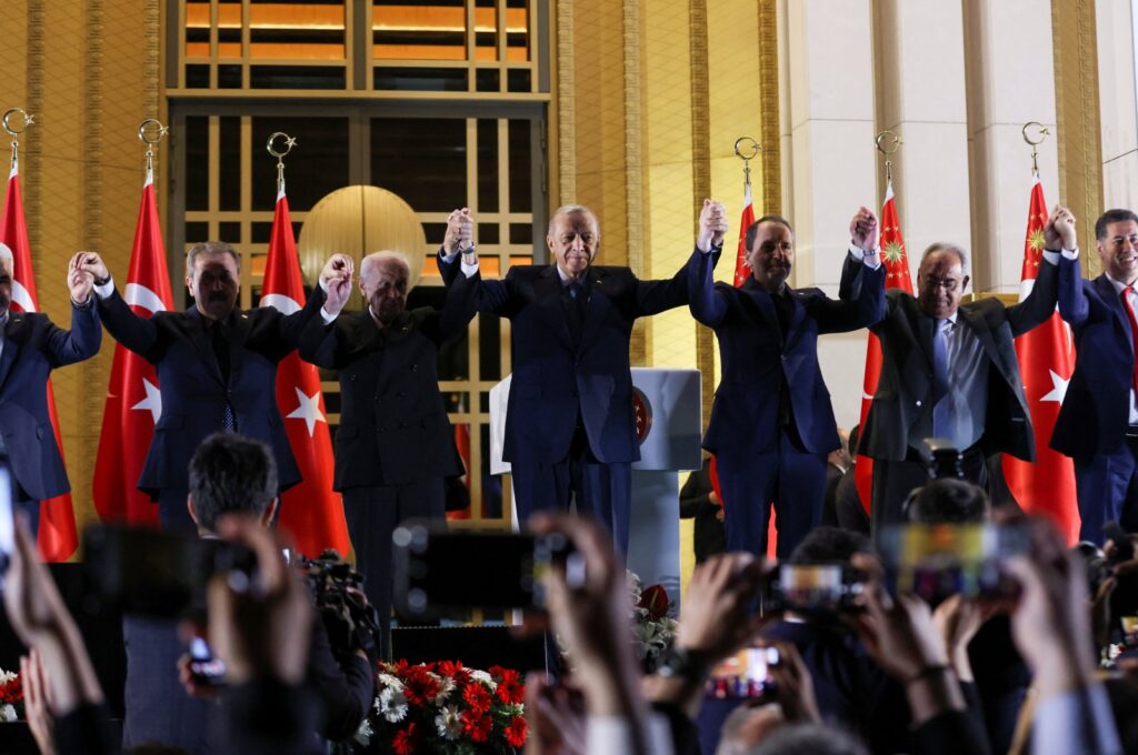 President Tayyip Erdoğan and his party's allies greet his supporters following his victory in the second round of the presidential election at the Presidential Palace in Ankara, Türkiye, May 29, 2023. (Reuters Photo)
