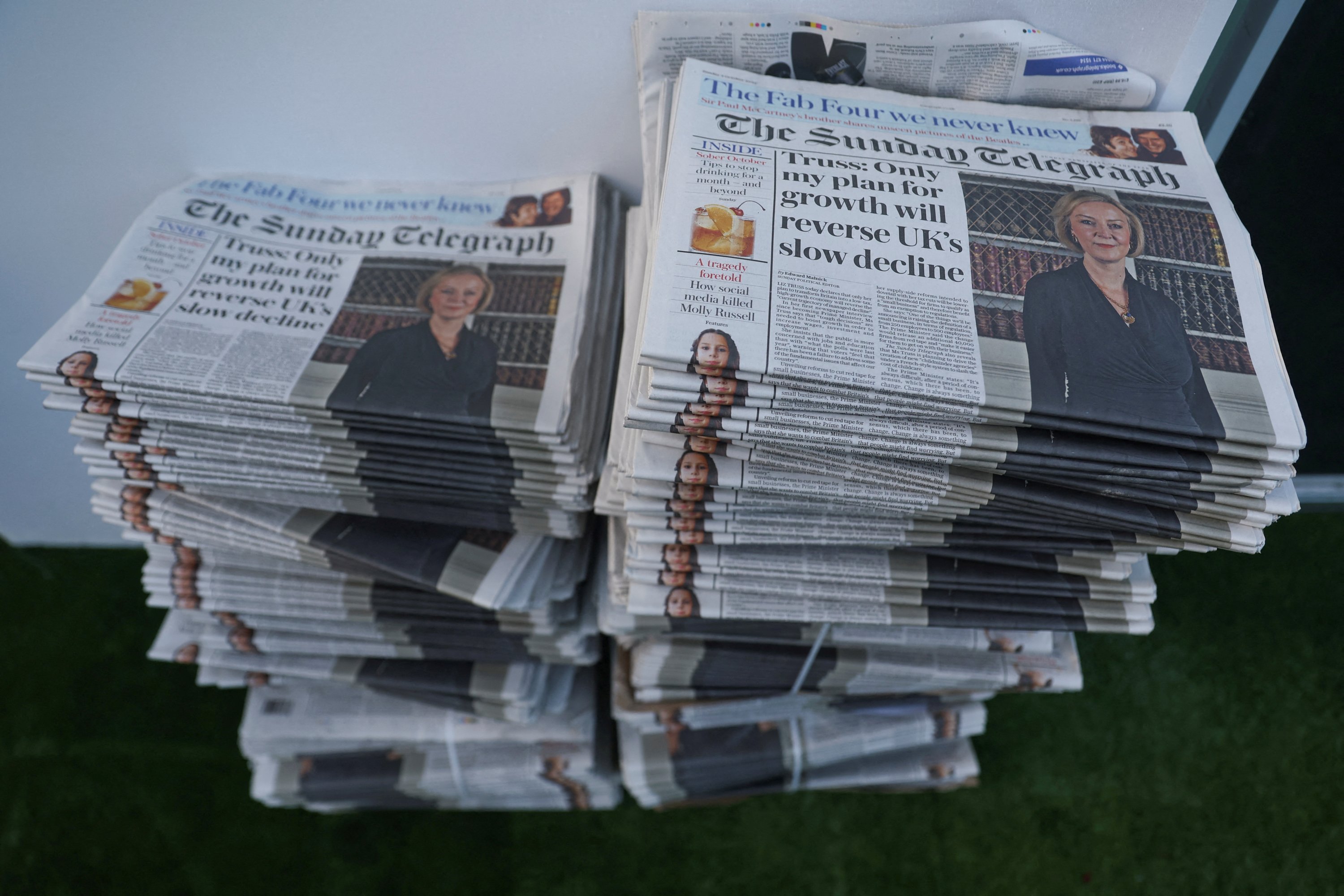 293521 Copies of The Sunday Telegraph, featuring former British Prime Minister Liz Truss on the cover, are stacked, as the Conservative Party hold their annual conference, in Birmingham, U.K., Oct. 2, 2022. (Reuters Photo)