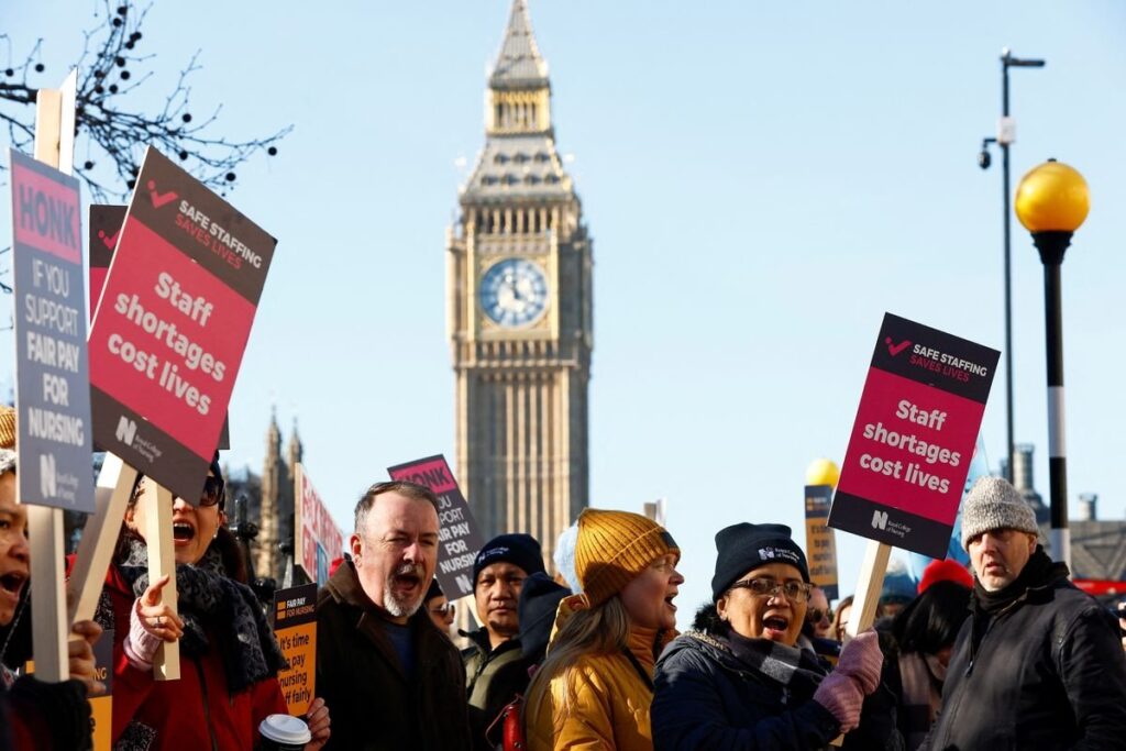 Nurses protest during a strike by NHS medical workers, amid a dispute with the government over pay, outside St Thomas' Hospital, in London, U.K., Feb. 6, 2023. (Reuters Photo)