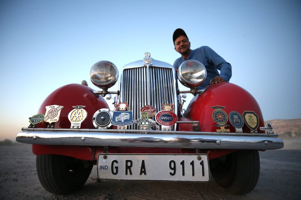 Indian businessperson Daman Thakore poses with his 1950 model classic car called "Lal Pari," Cappadocia, Türkiye, Sept. 26, 2023. (AA Photo)