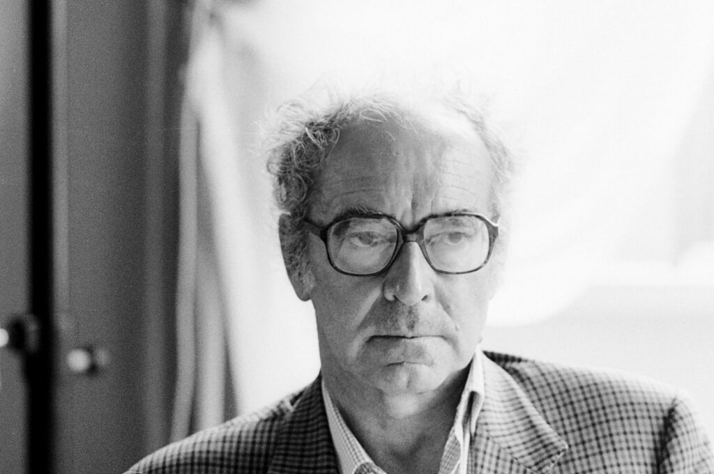 Jean-Luc Godard, French-Swiss film director, screenwriter and film critic. He is often identified with the 1960s French film movement La Nouvelle Vague, or French New Wave. Locarno, Aug. 9, 1995. (Getty Images Photo)