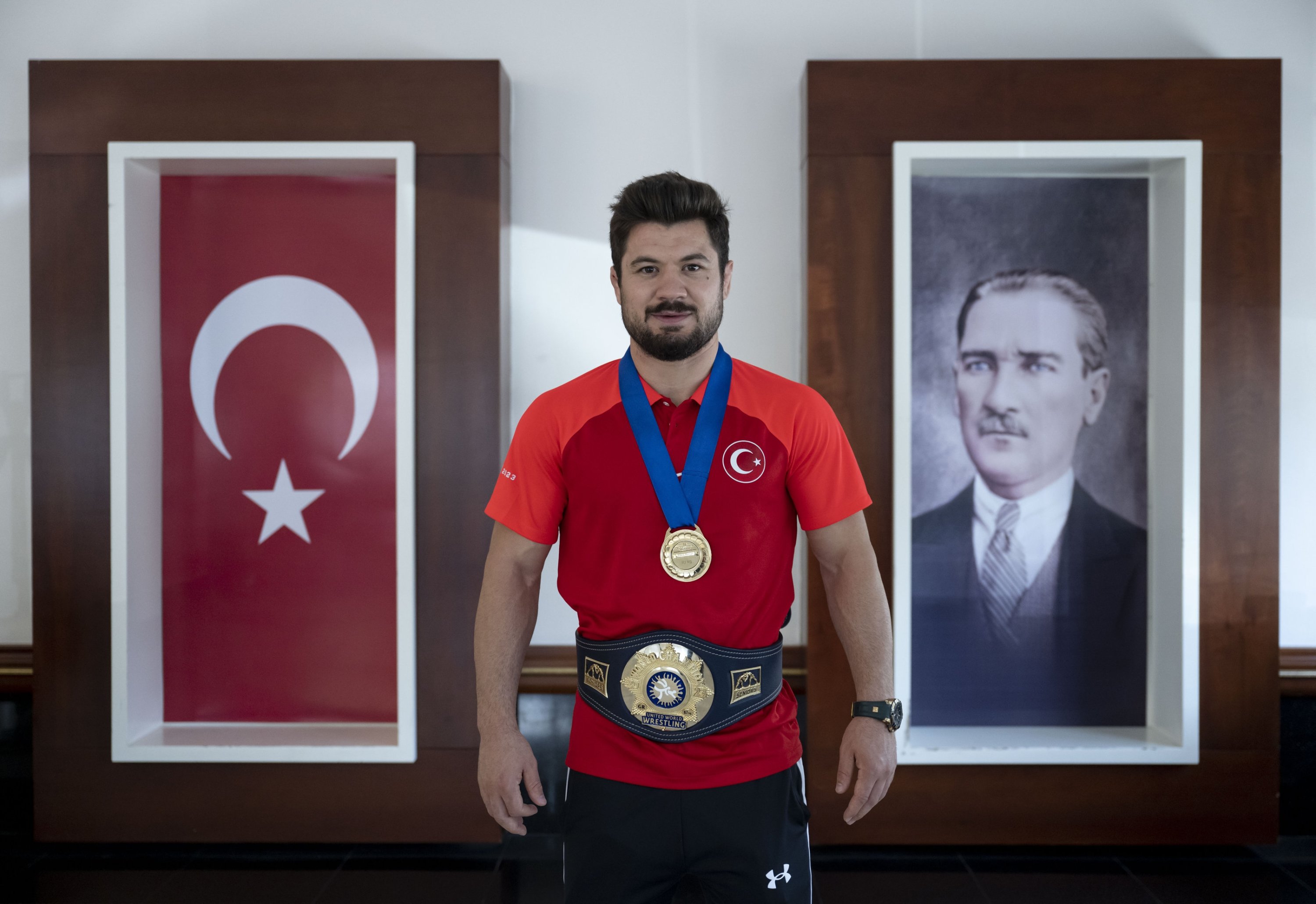 294008 Turkish wrestler Ali Cengiz poses for a photo with a belt he won after beating David Losonczi in the World Wrestling Championships final, Ankara, Türkiye, Sept. 25, 2023. (AA Photo)