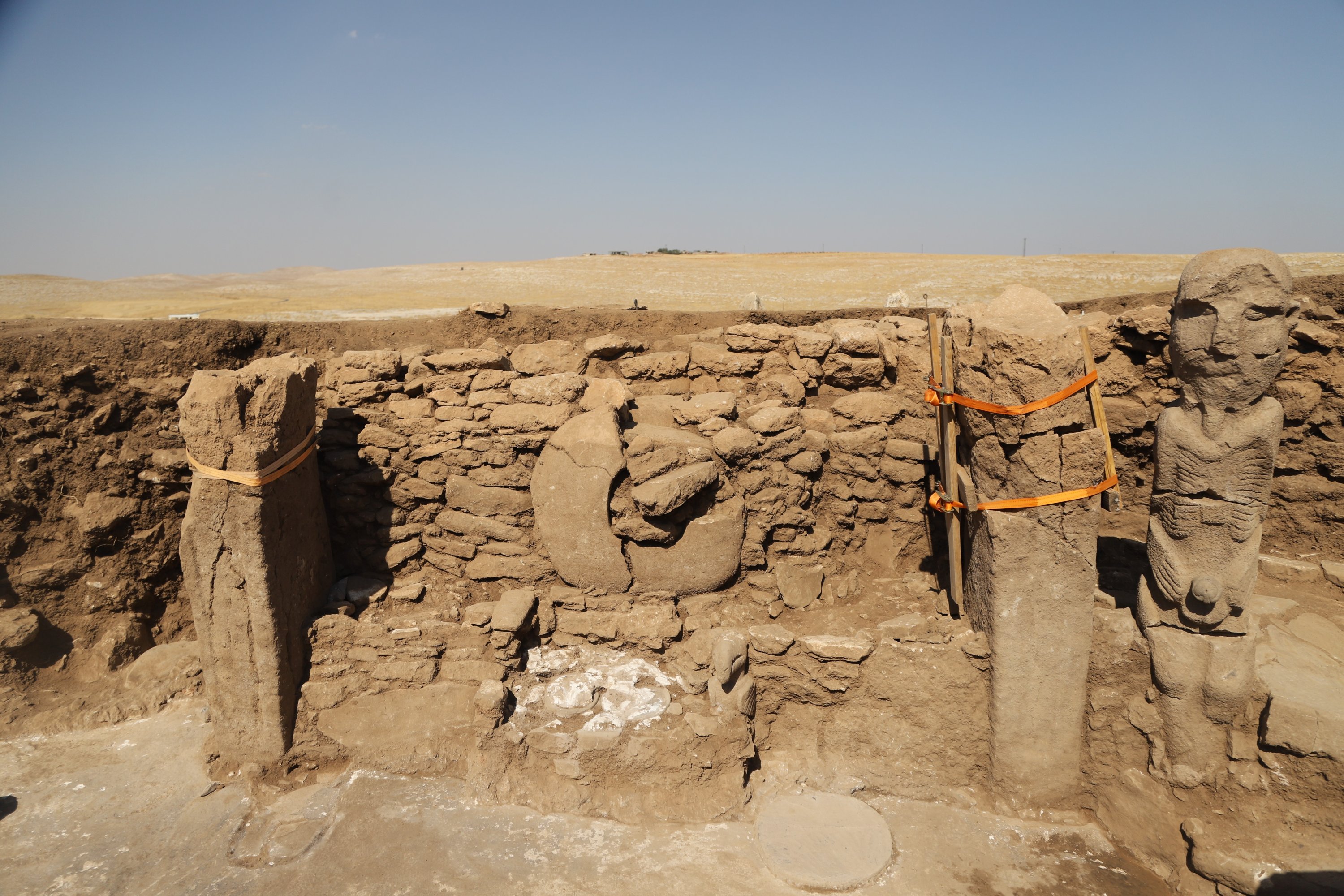 294510 A life-size wild boar statue made of limestone and a humanlike statue were unearthed in the 'D structure' of Göbeklitepe, Şanlıurfa, Türkiye, Sept. 30, 2023. (IHA Photo)