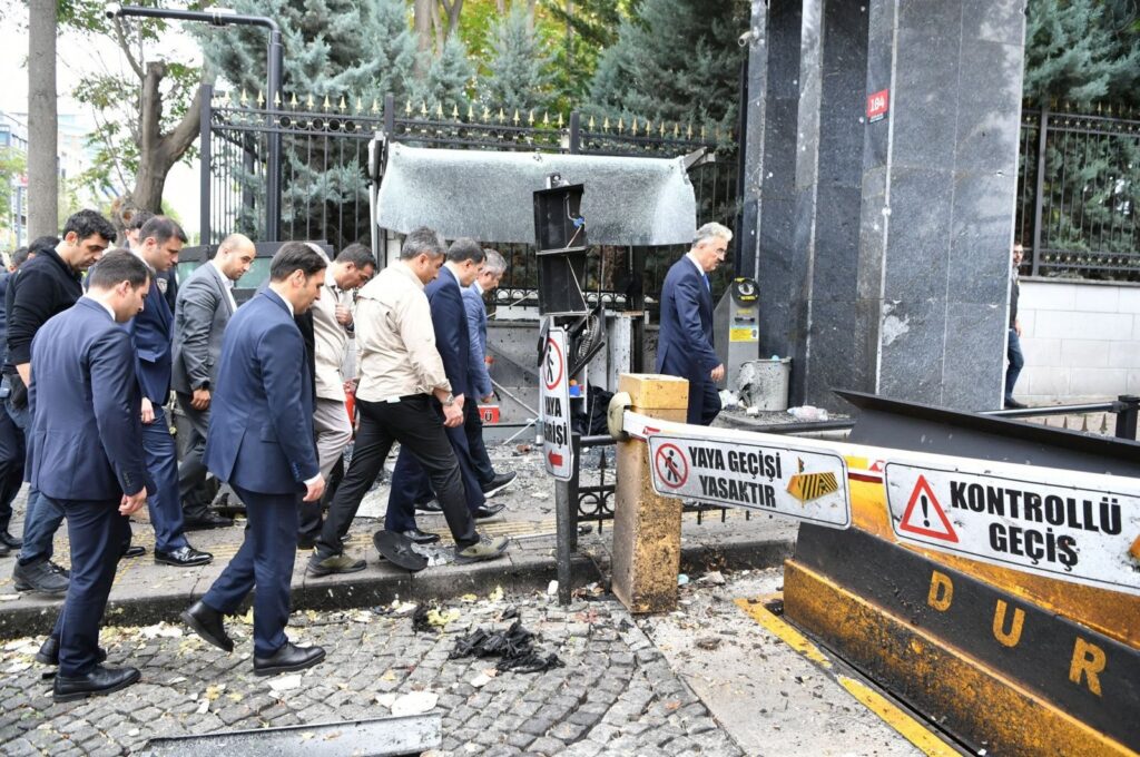 Governor Vasip Şahin along with other officials inspect the scene outside the Ministry of Interior, Ankara, Türkiye, Oct. 2, 2023. (AA Photo)