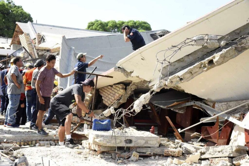 Rescue workers search for survivors amid debris after the roof of a church collapsed in Ciudad Madero, Mexico, Oct. 1, 2023. (AP Photo)