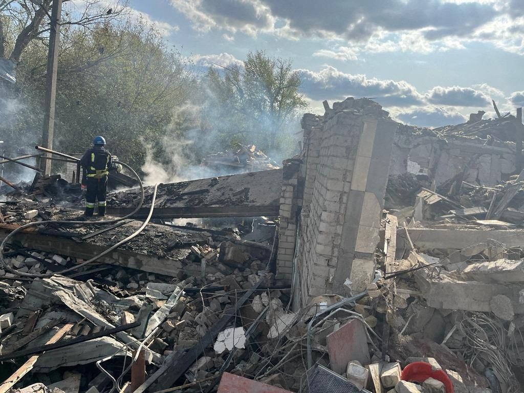 Firefighters work at the site of a Russian military strike in the village of Hroza, in Kharkiv region, Ukraine, Oct. 5, 2023. (Reuters Photo)